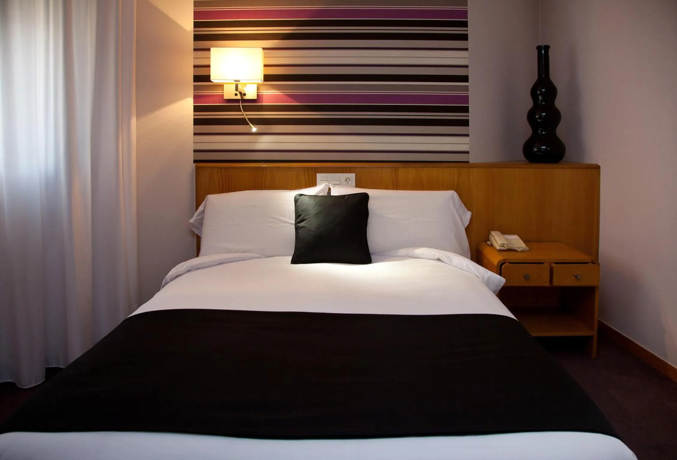 Bed in Hotel Palacio de Cristal