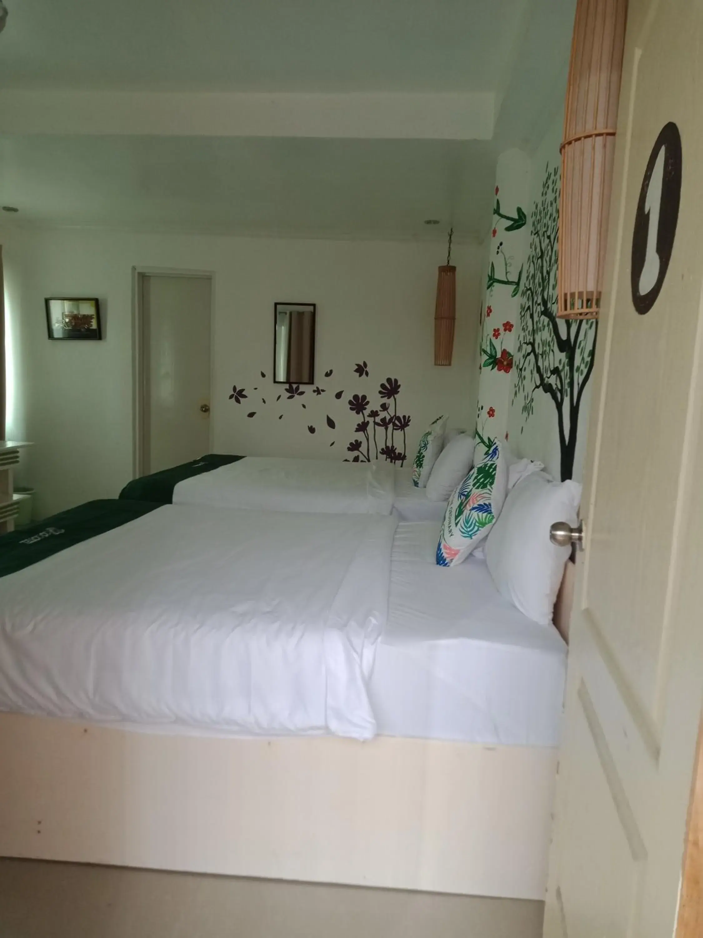 Bed in The Cronin Residences by Cocotel Bed in The Cronin Residences by Cocotel