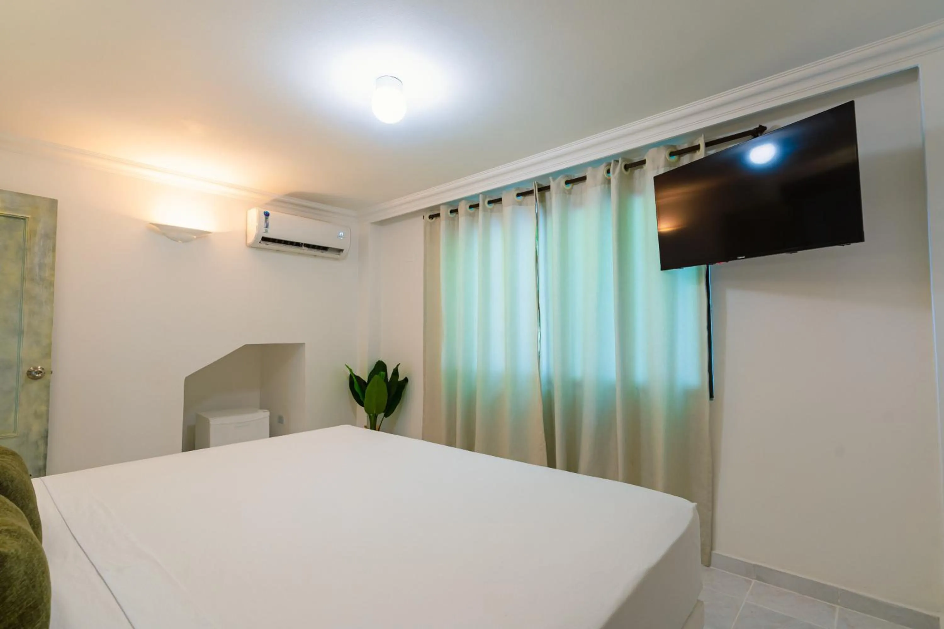 Bed in Hotel Cocoliso Island Resort