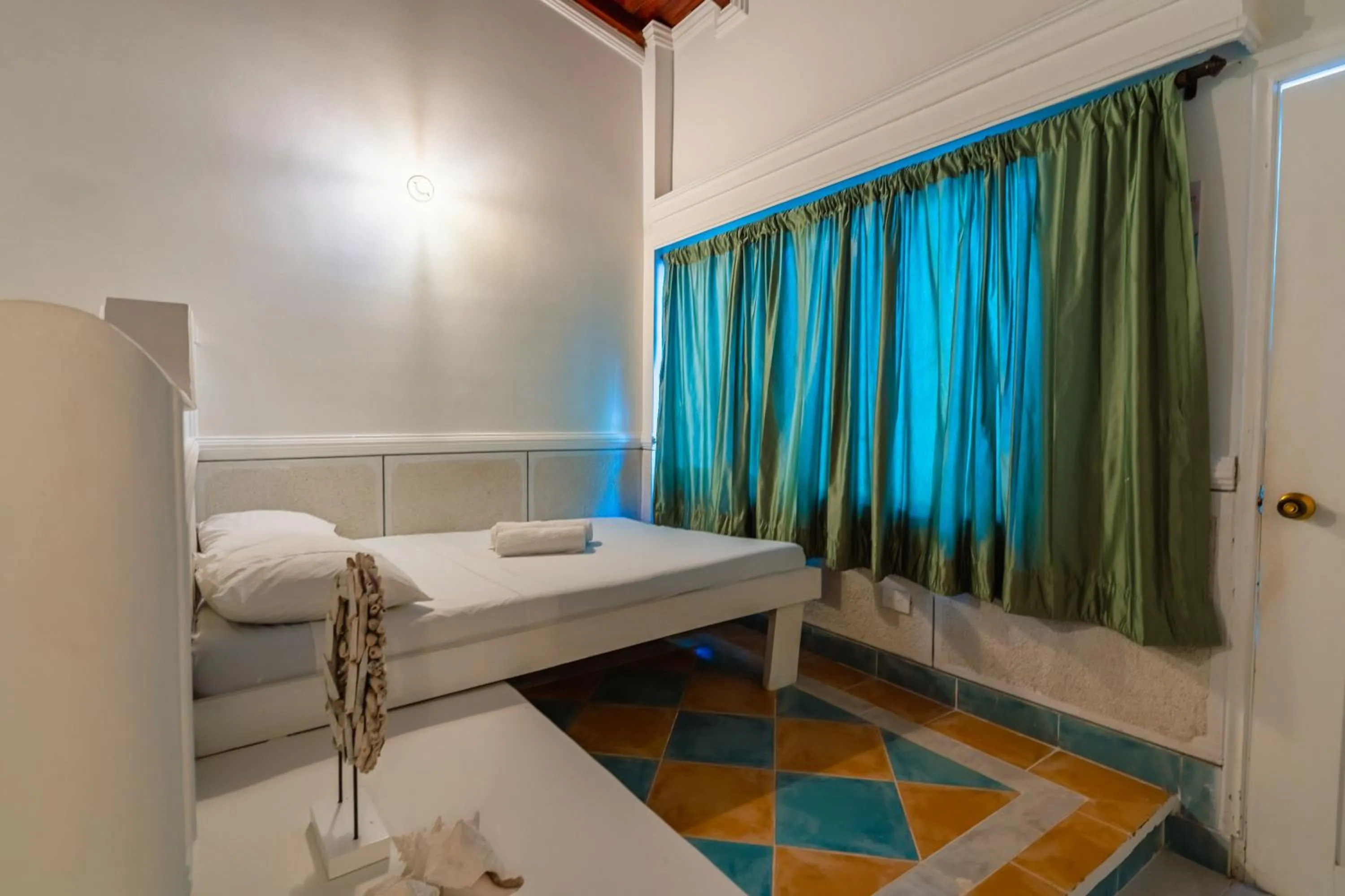 Bed in Hotel Cocoliso Island Resort