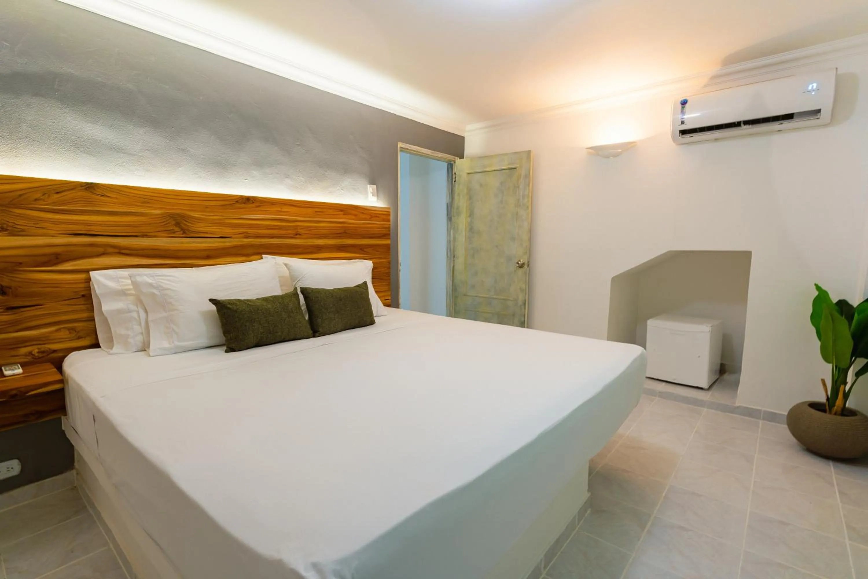 Bed in Hotel Cocoliso Island Resort