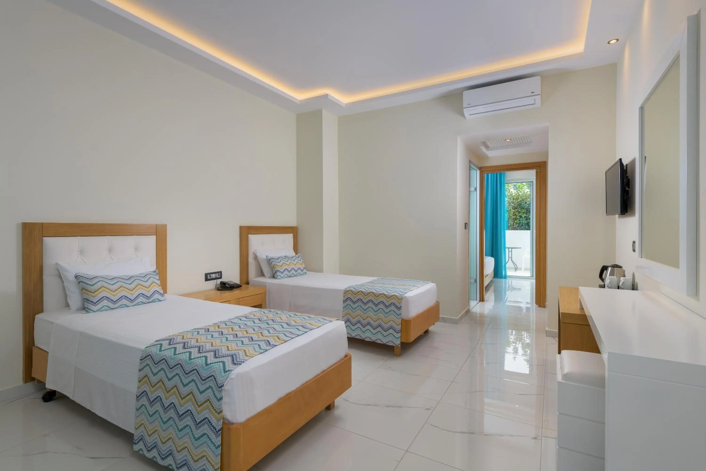 Bed in Oceanis Park Hotel