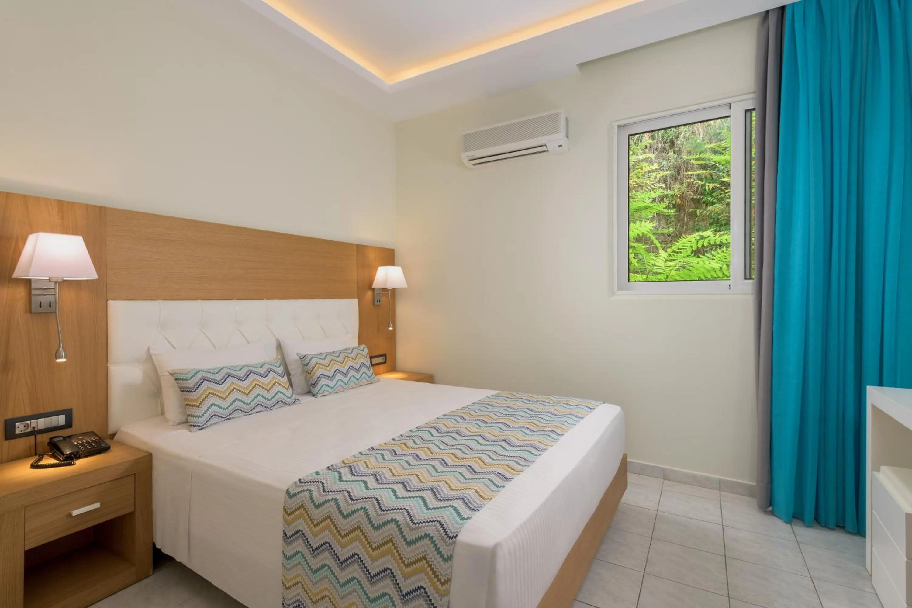 Bed in Oceanis Park Hotel