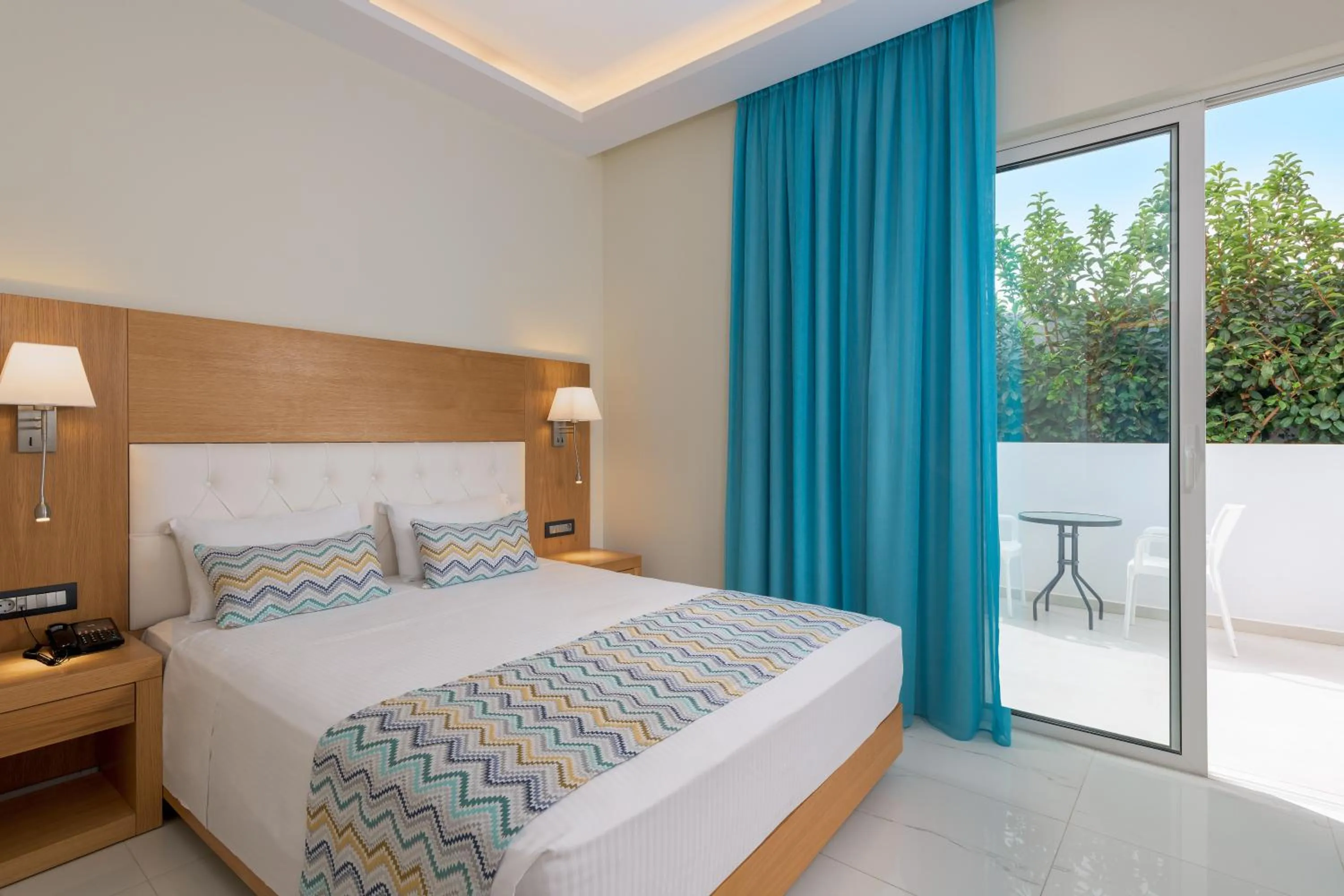 Bed in Oceanis Park Hotel