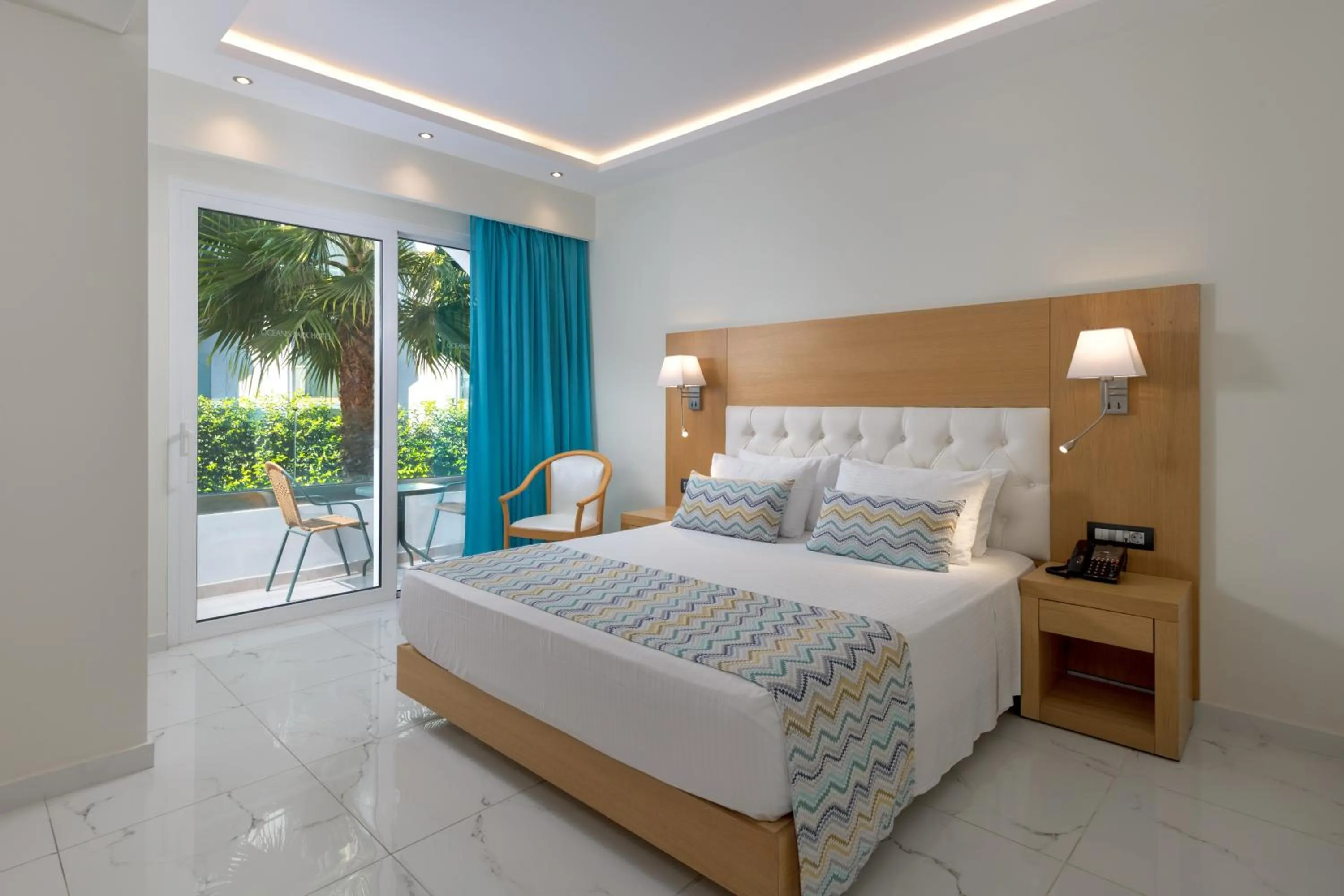 Bed in Oceanis Park Hotel