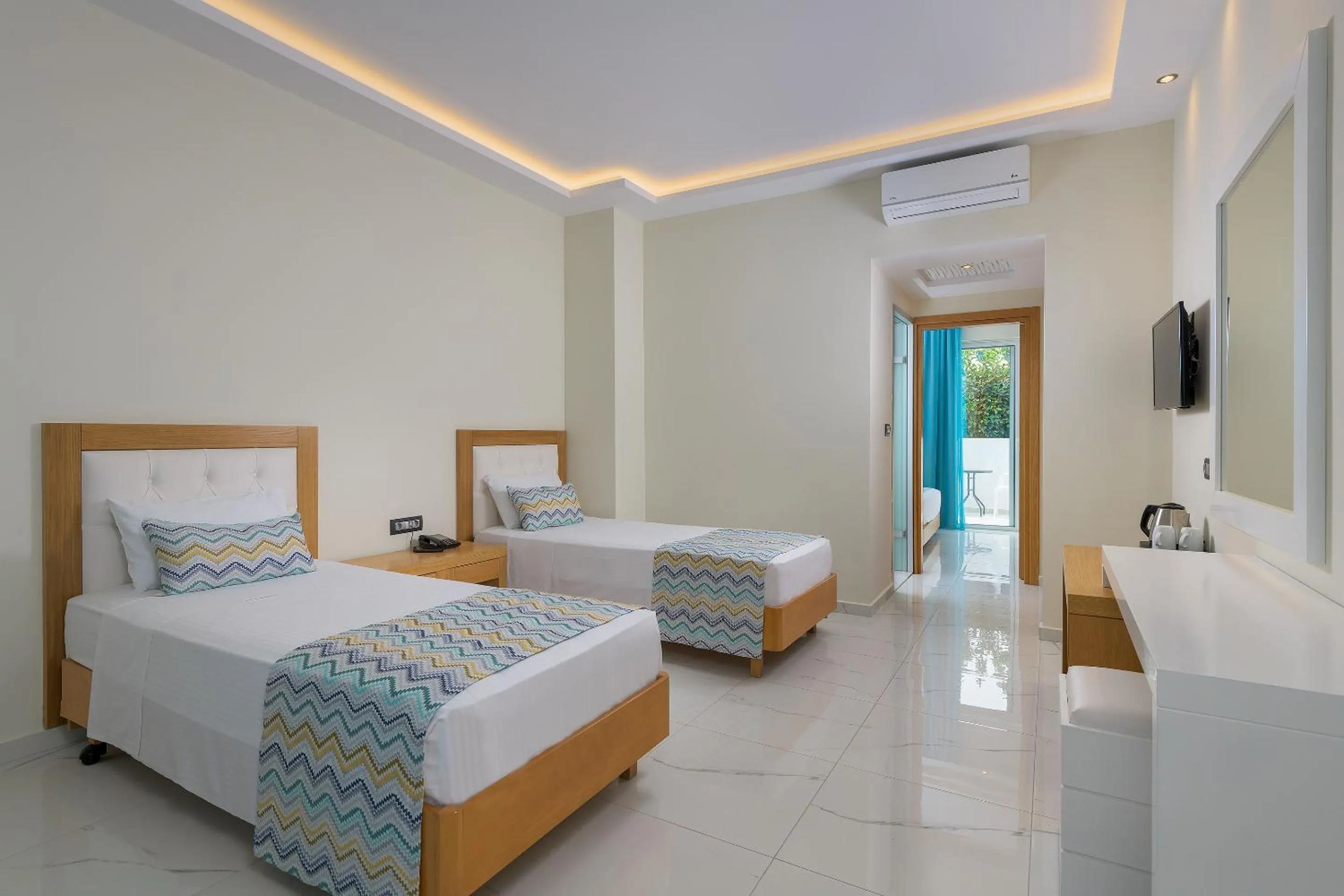 Bed in Oceanis Park Hotel