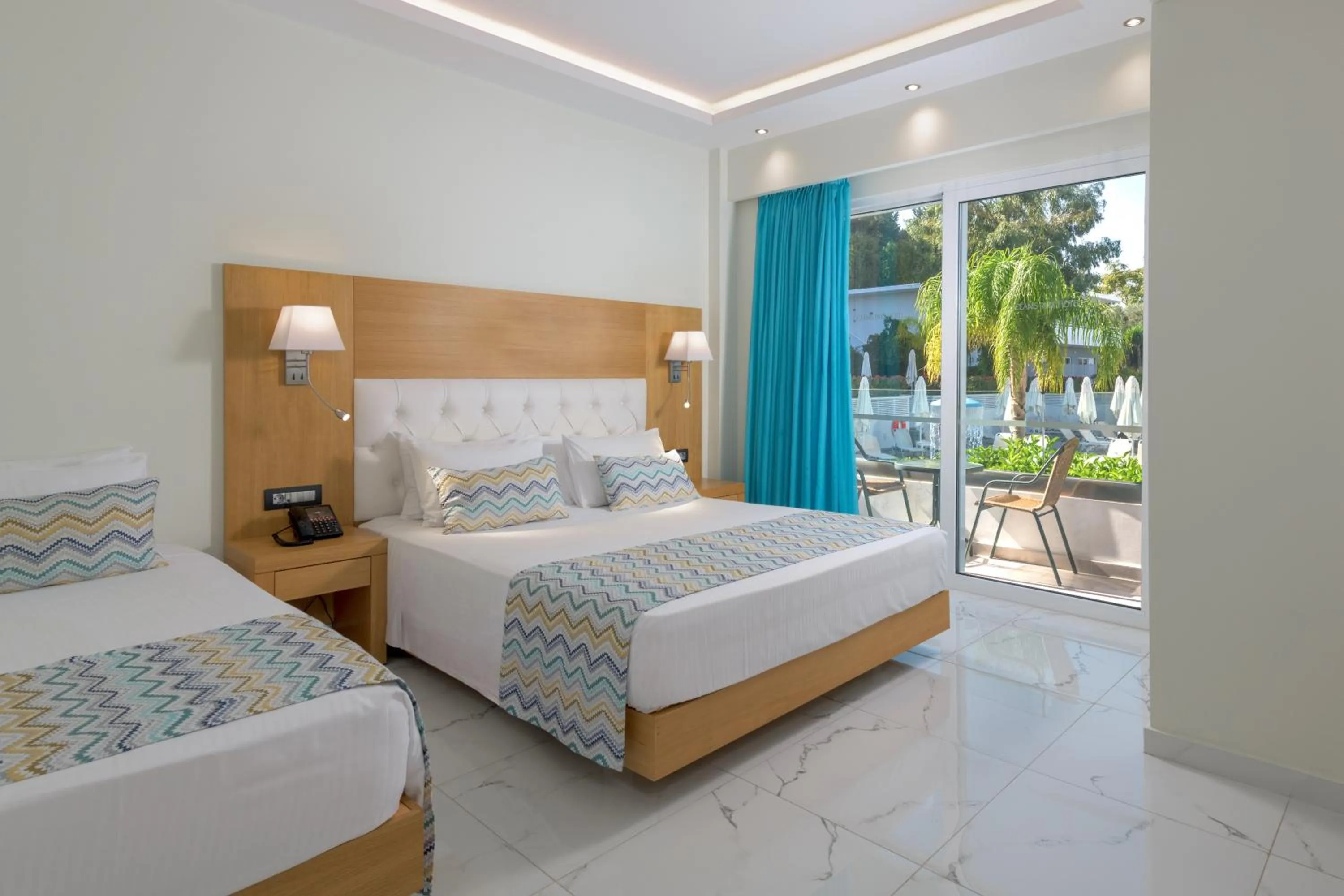 Bed in Oceanis Park Hotel