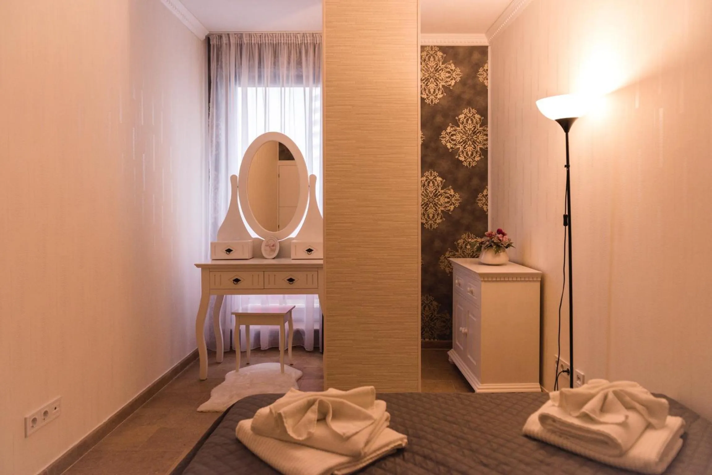 Bed in Lira Holiday Apartments