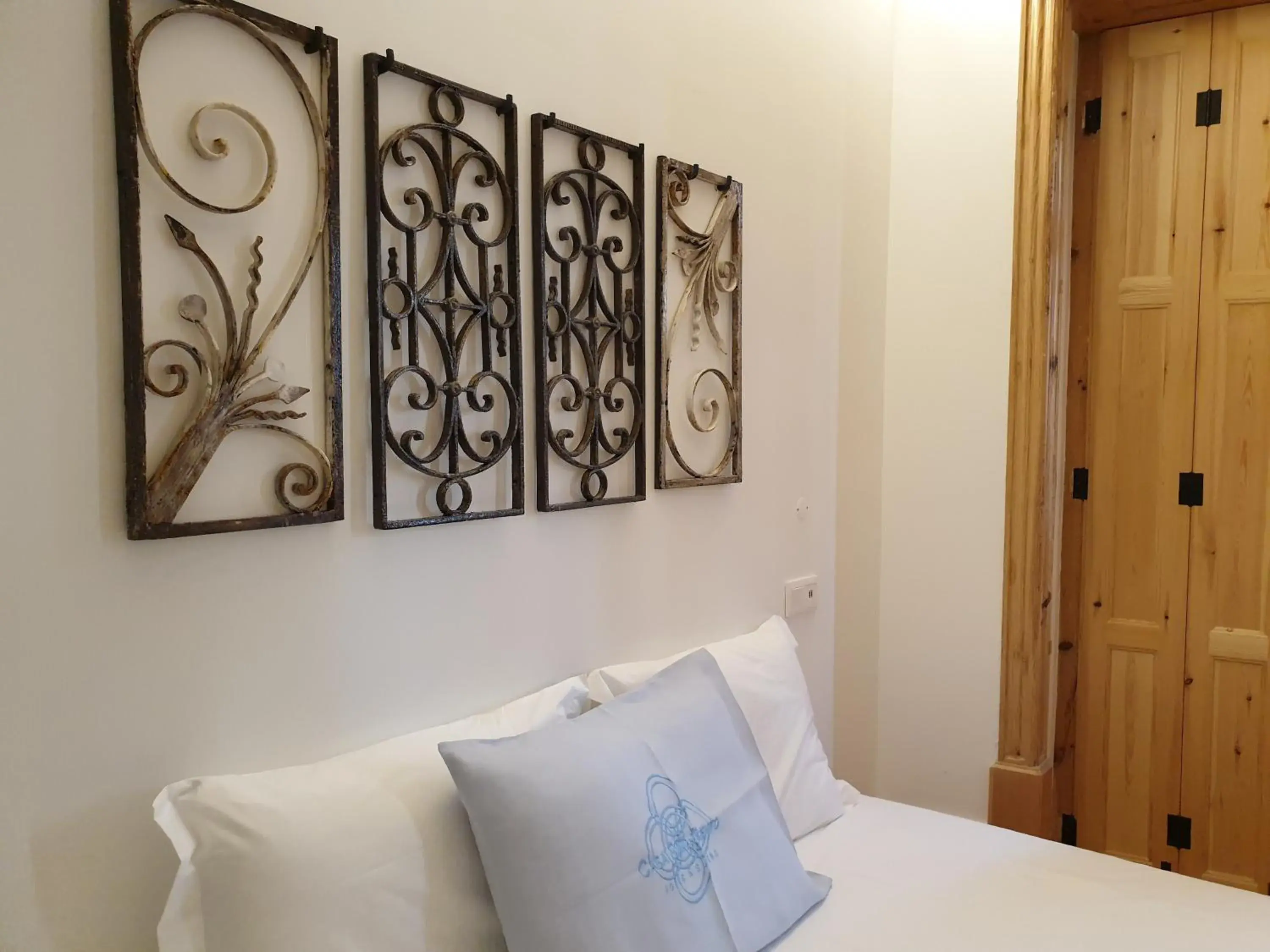 Bed in Casa da Baixa by PURUS Bed in Casa da Baixa by PURUS