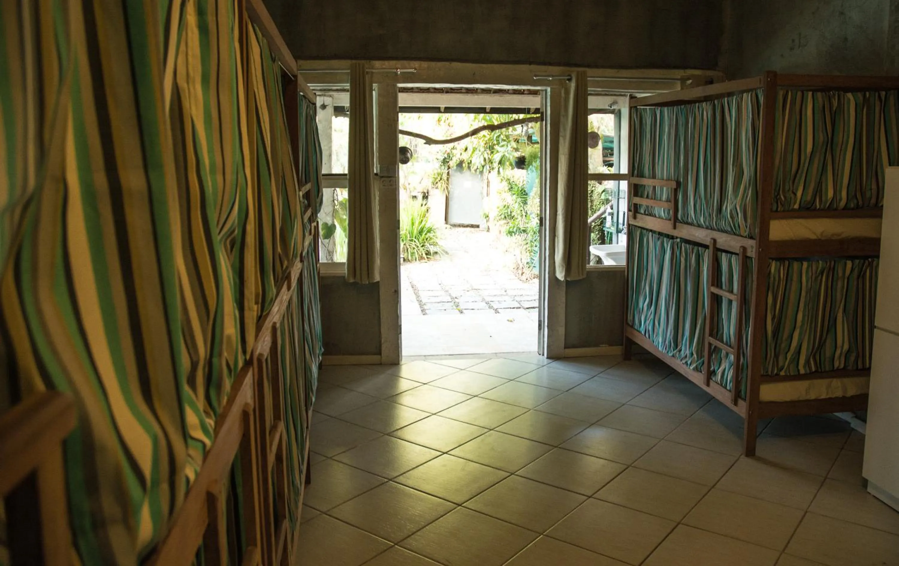 Bed in Jardim Secreto Guest House