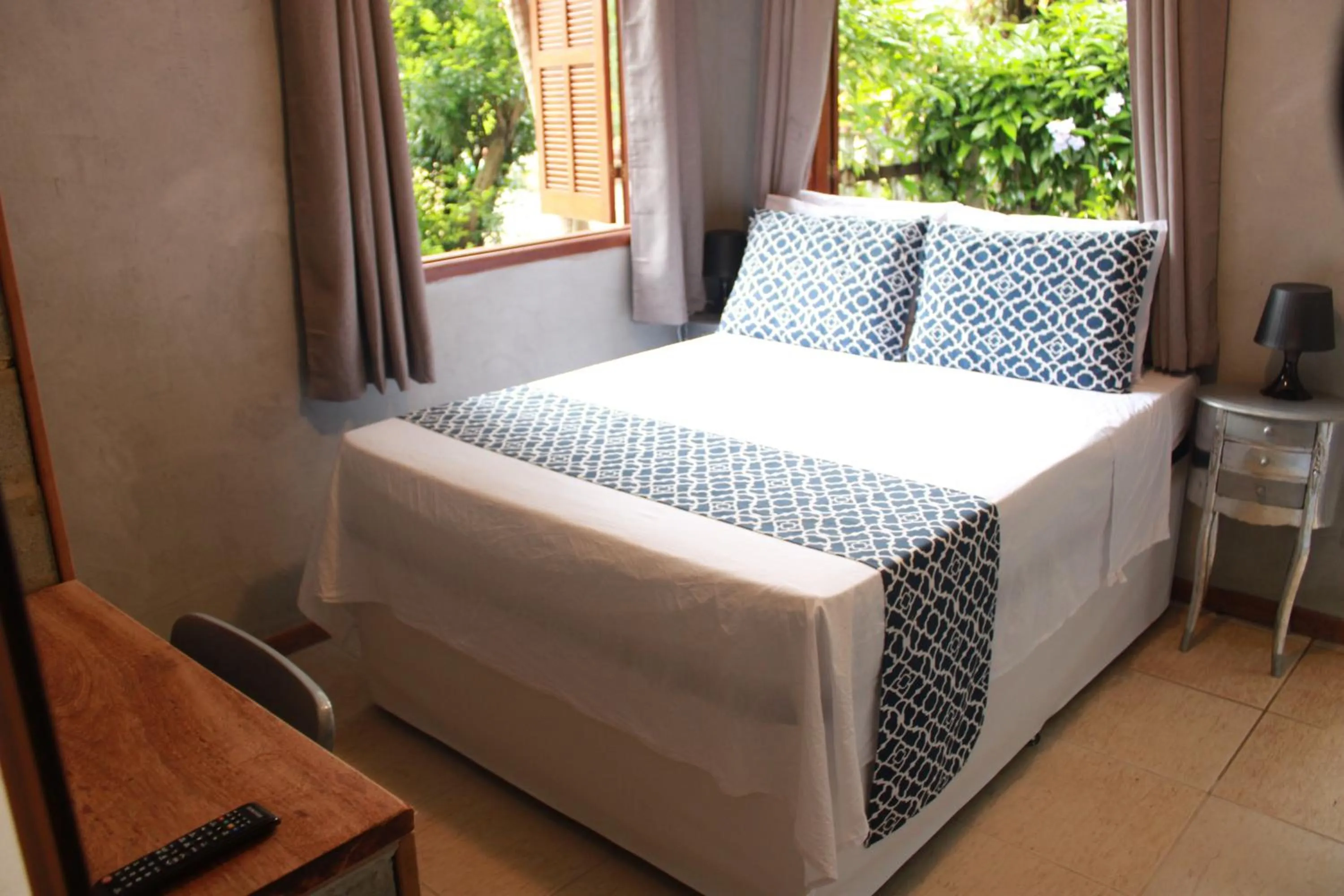 Bed in Jardim Secreto Guest House