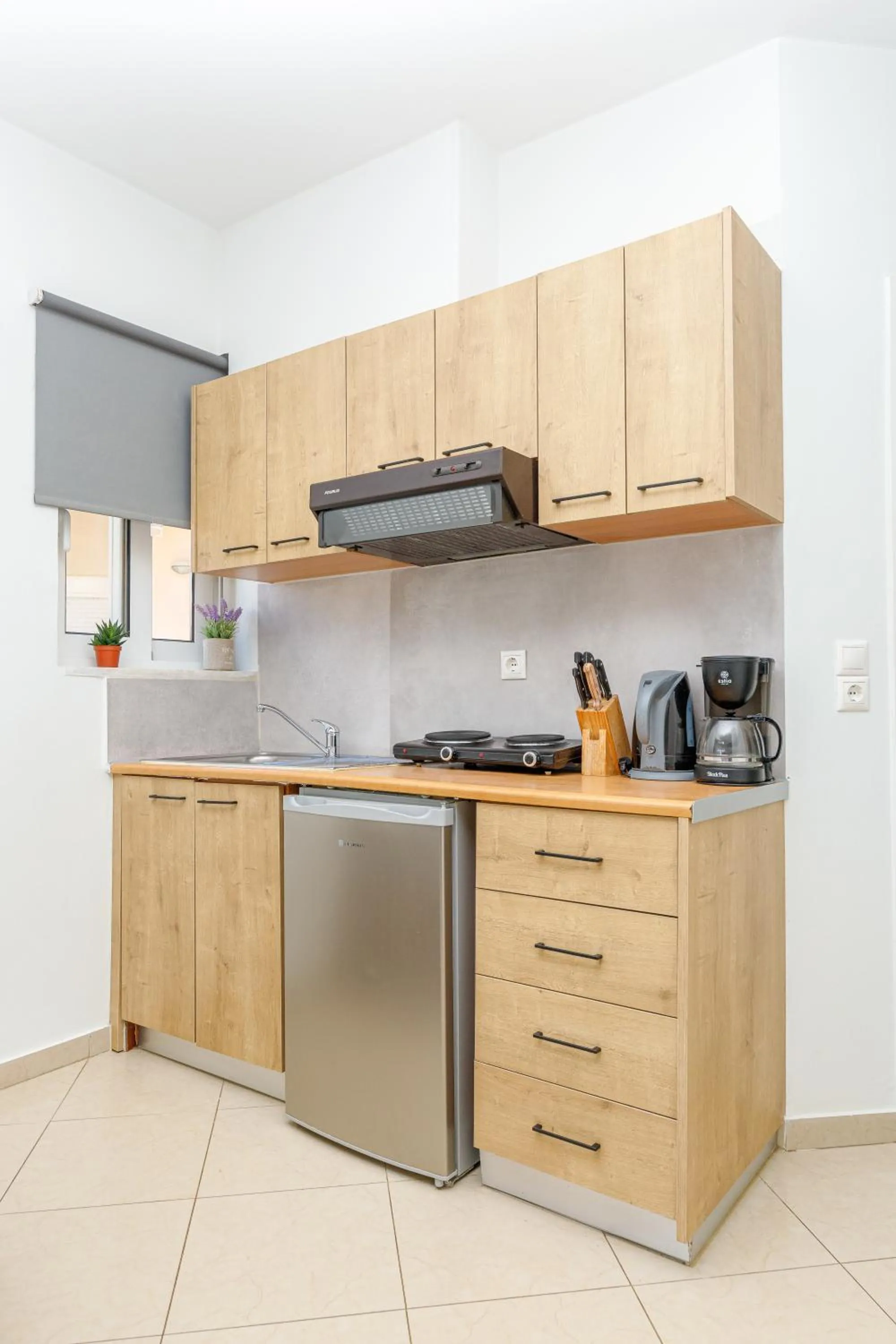 Kitchen or kitchenette in Sun Beach Apartments