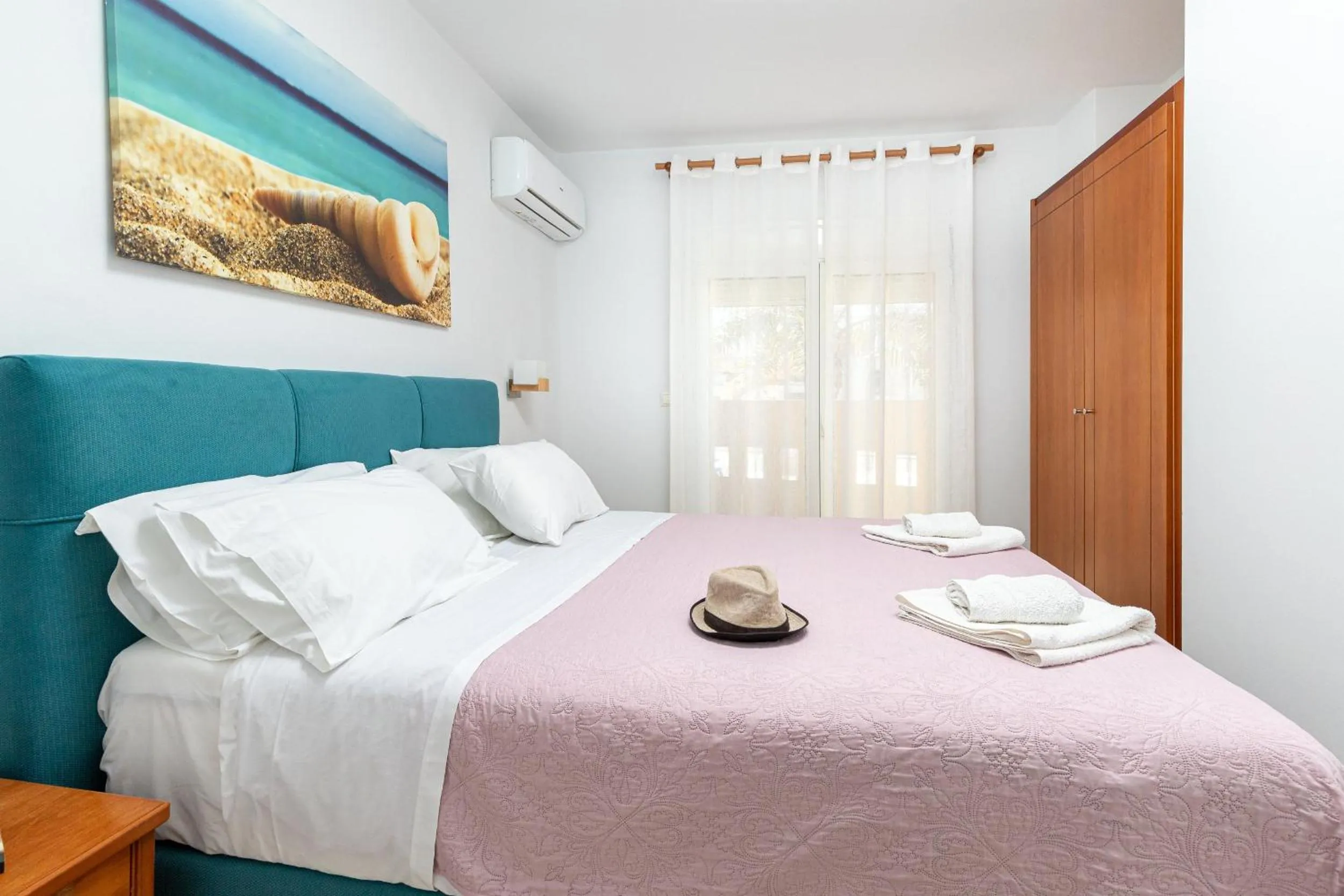 Bed in Sun Beach Apartments