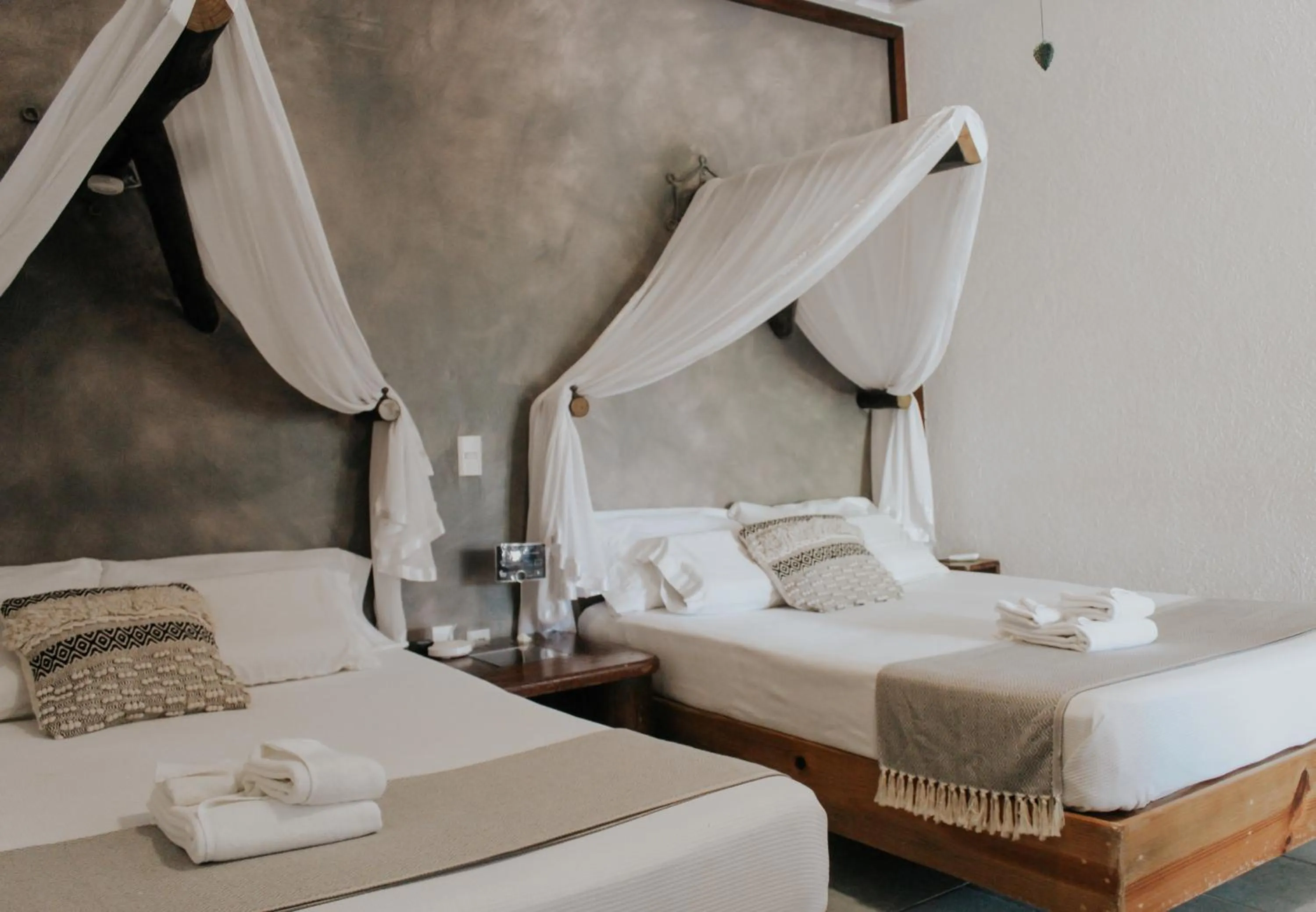 Bed in Casa de Olas Boutique Hotel