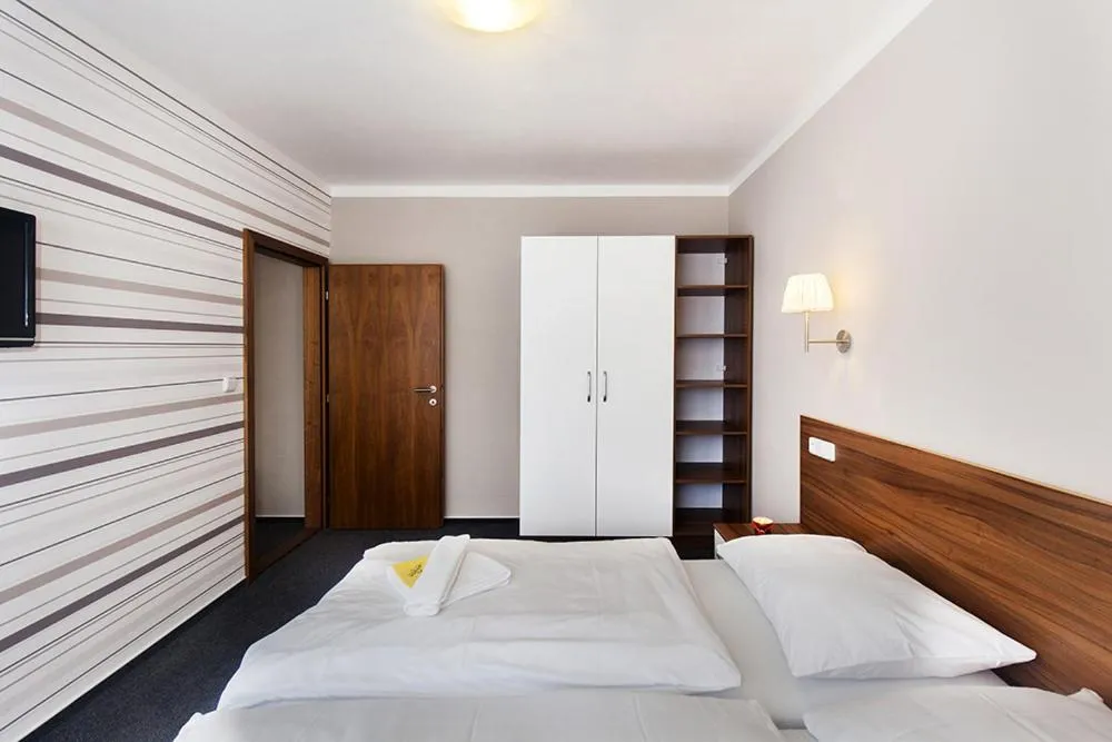 Bed in Hotel Arkáda