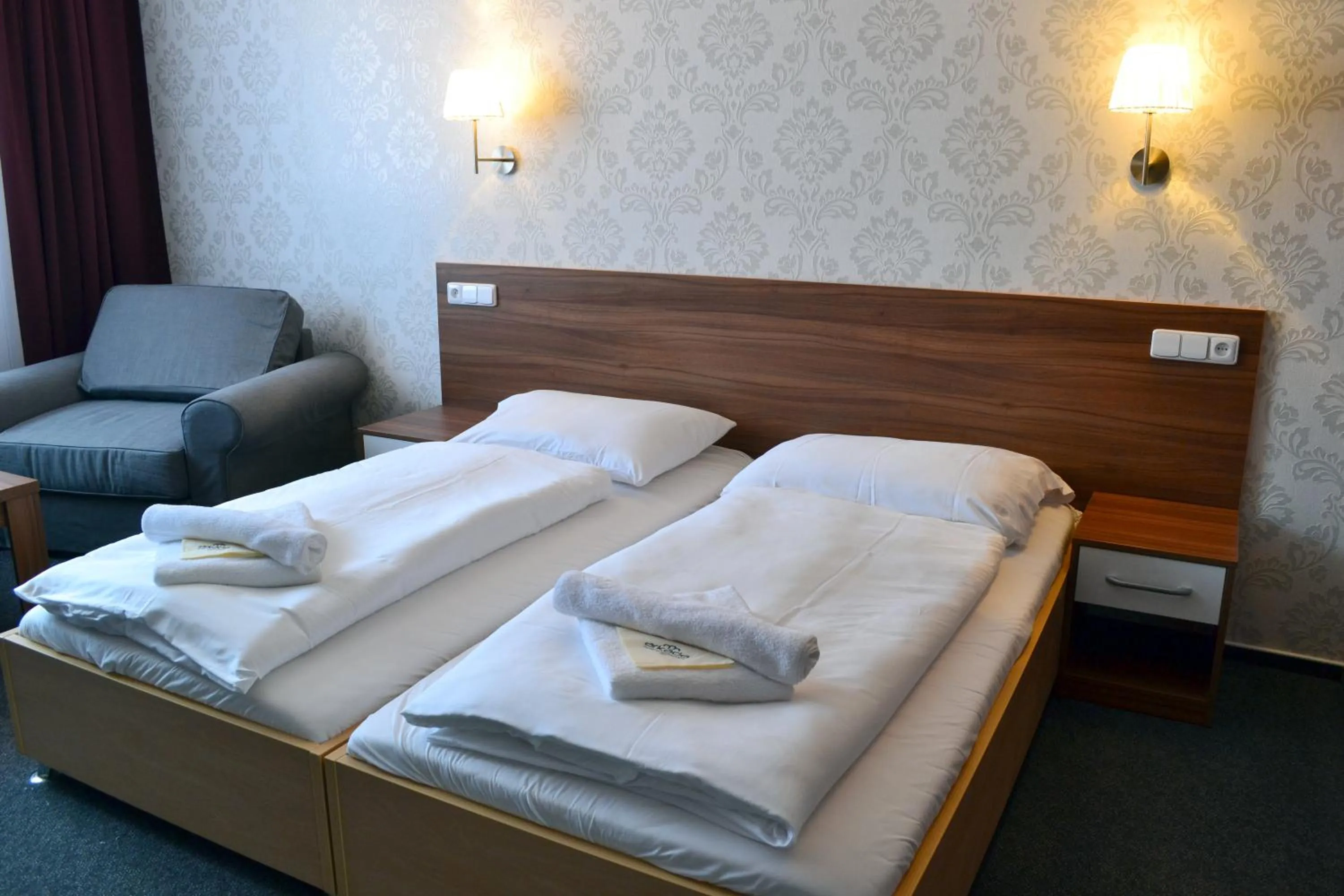 Bed in Hotel Arkáda