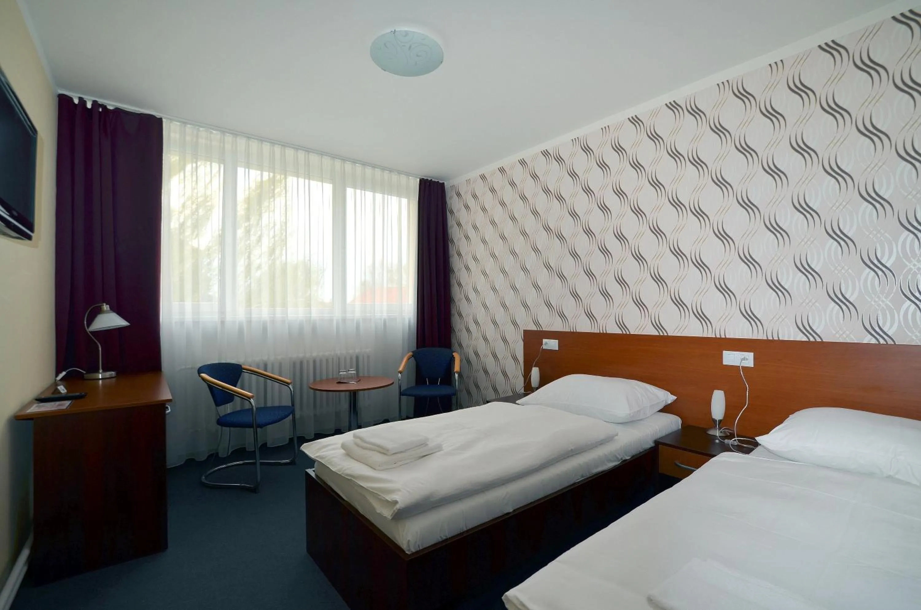 Photo of the whole room, Bed in Hotel Arkáda