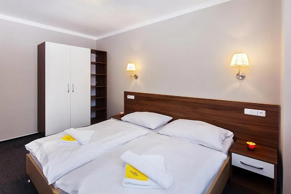 Bed in Hotel Arkáda