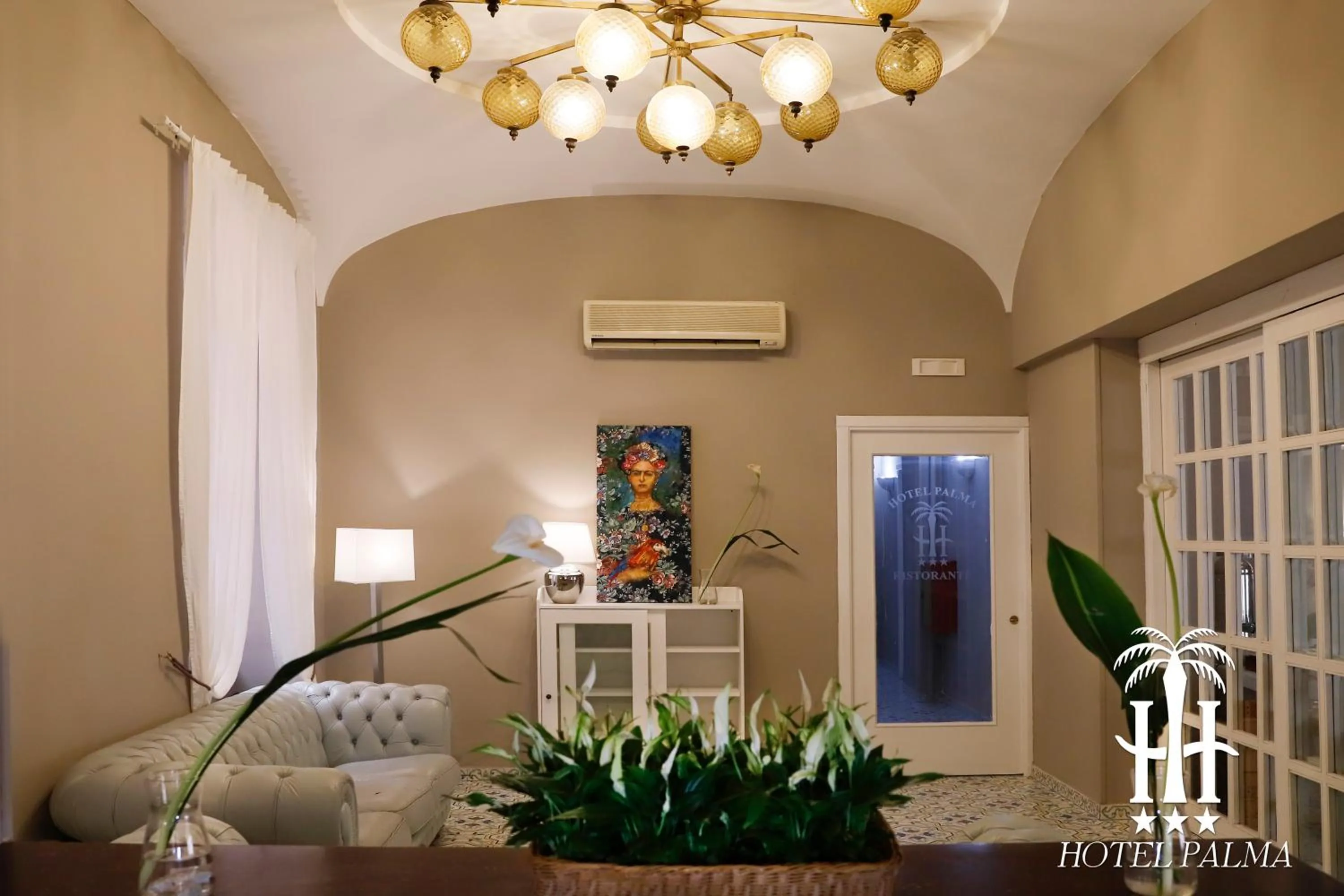 Living room, Bed in Hotel Palma