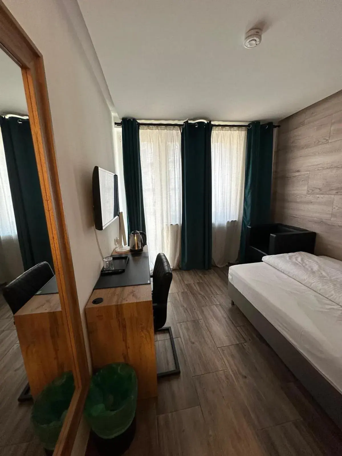 Bedroom, Bed in Rheinmetropole Hotel Bedroom, Bed in Rheinmetropole Hotel