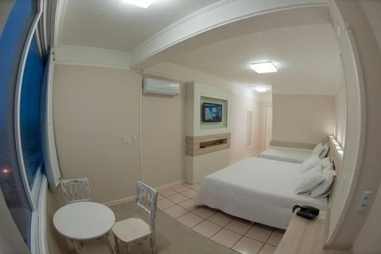 Bed in Hotel Araçá