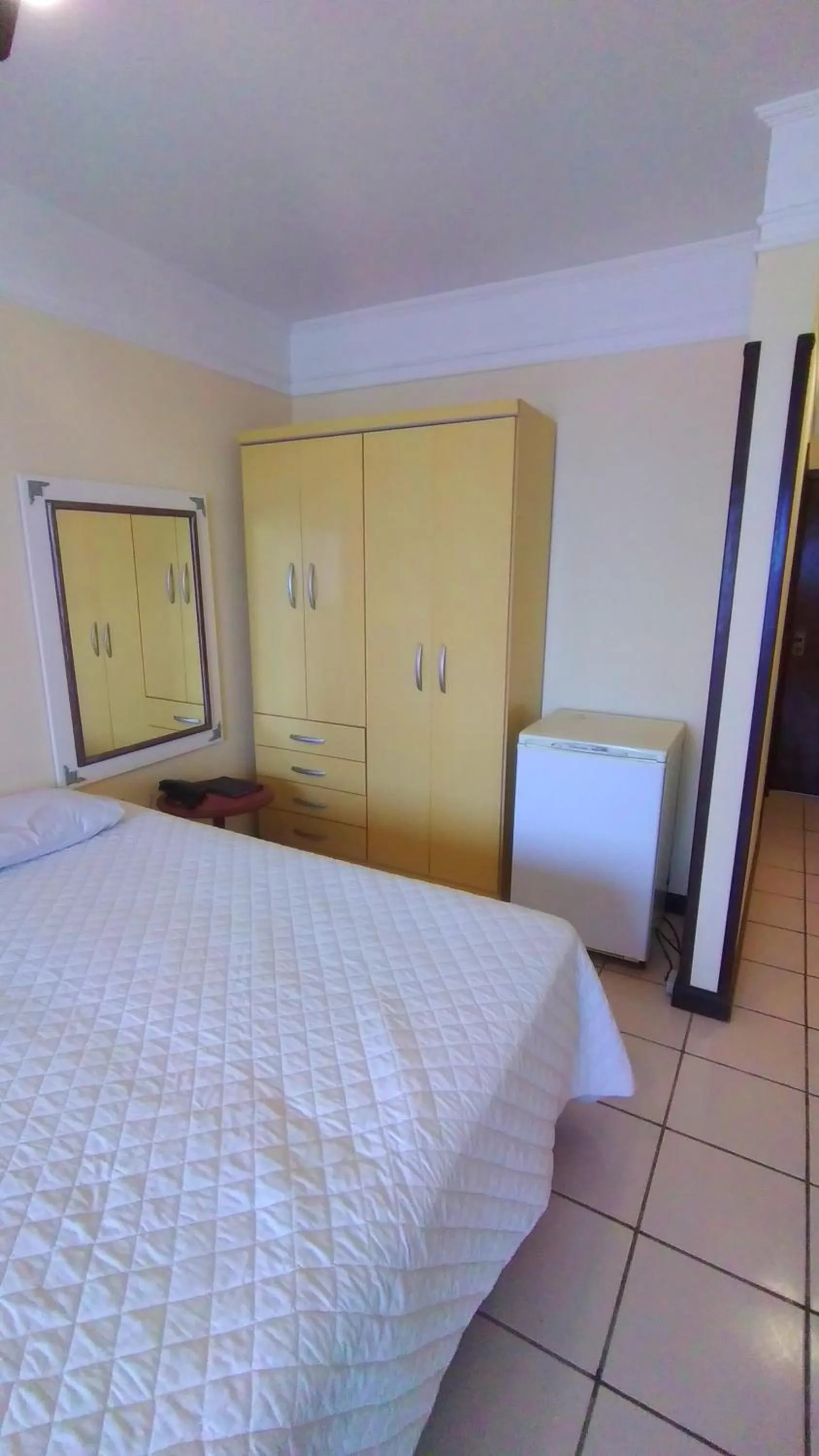 Bed in Hotel Araçá