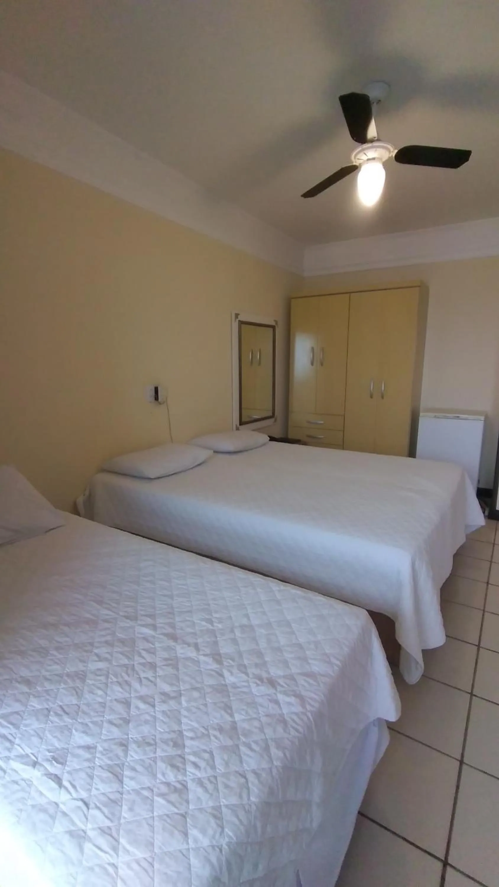 Bed in Hotel Araçá