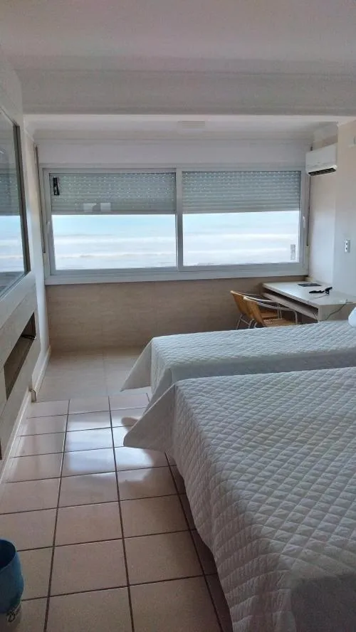 Bed in Hotel Araçá