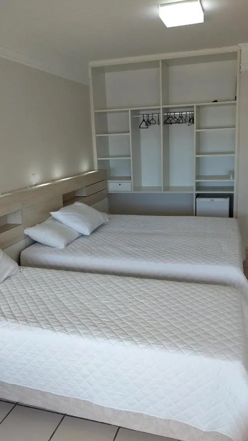 Bed in Hotel Araçá