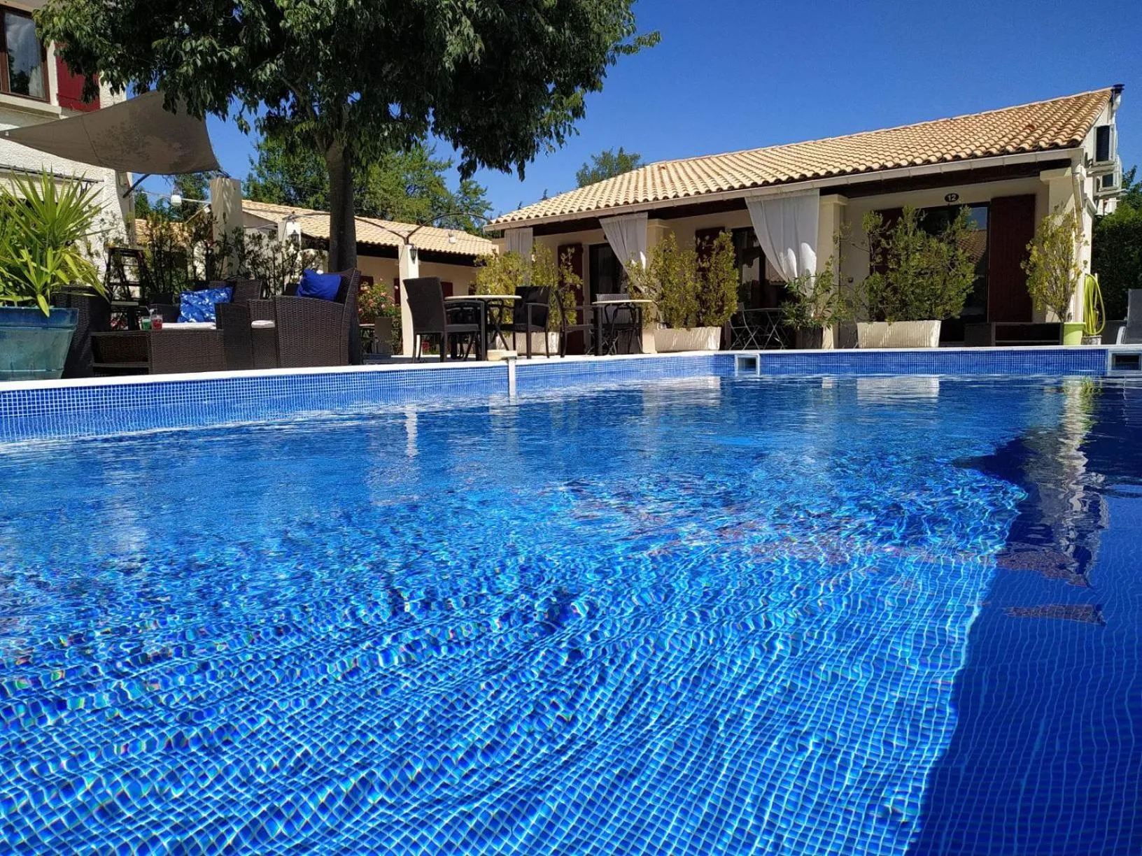 Swimming pool in Hôtel Le Mas Des Amandiers
