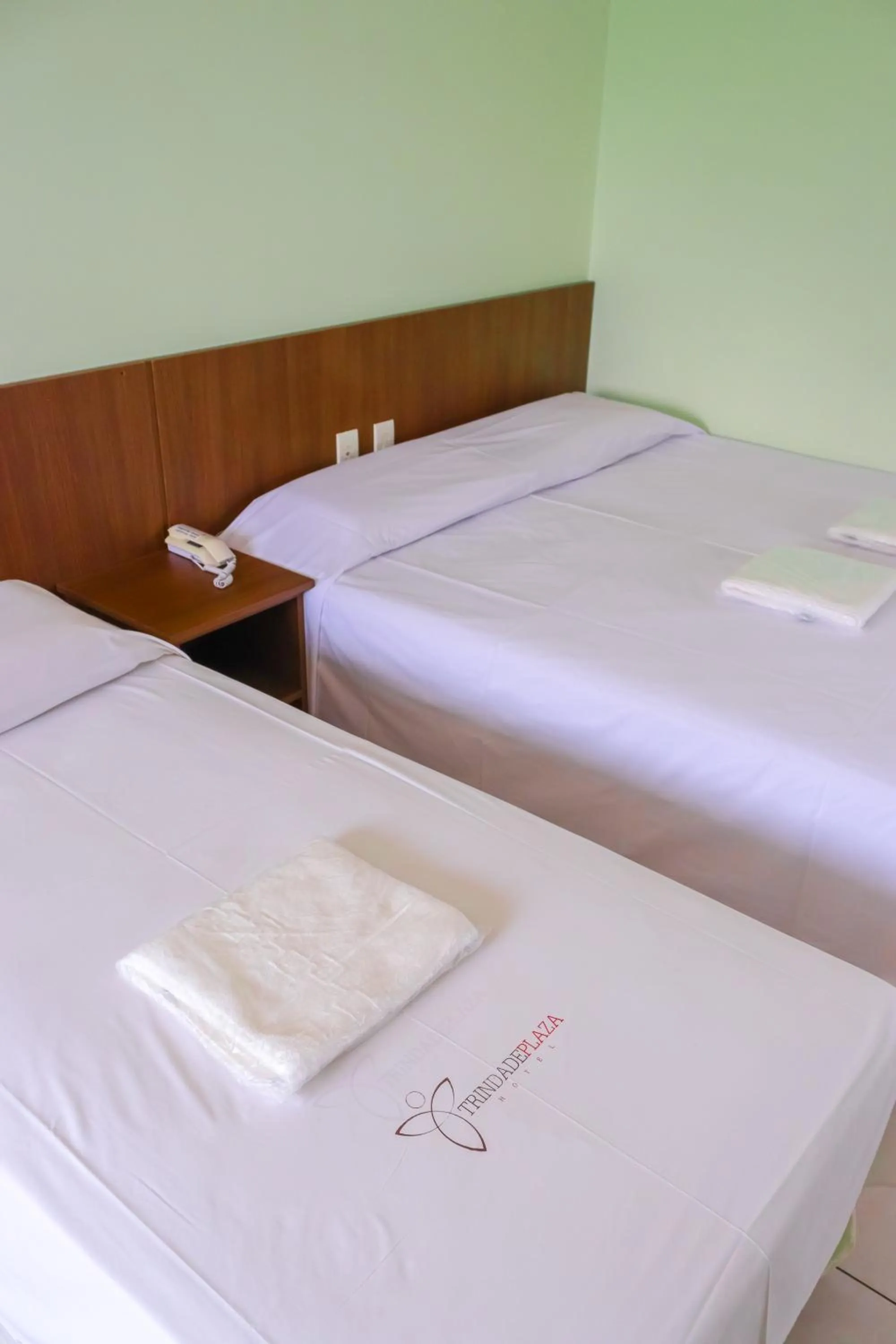 Bed in Trindade Plaza Hotel