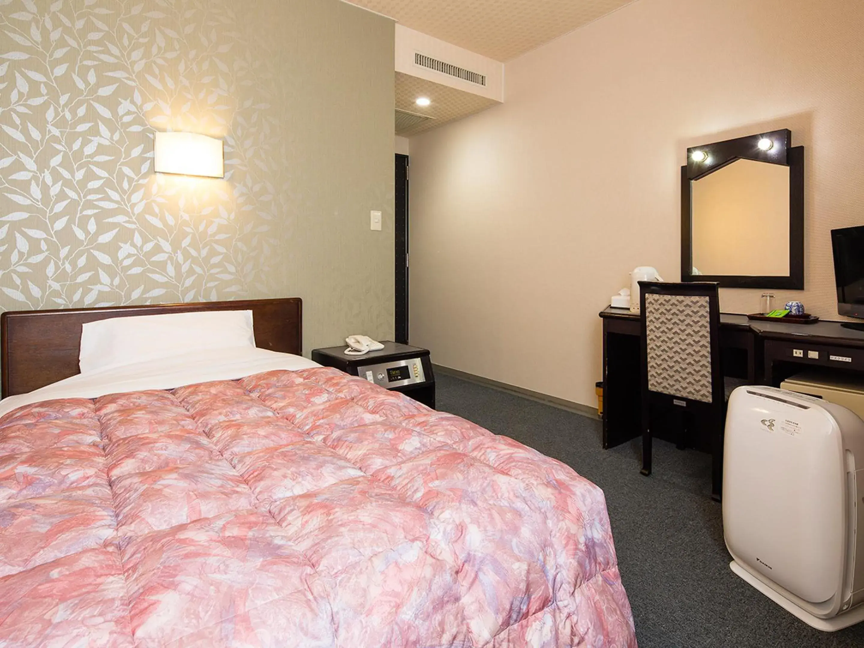 Bed in Kotohira Riverside Hotel Bed in Kotohira Riverside Hotel