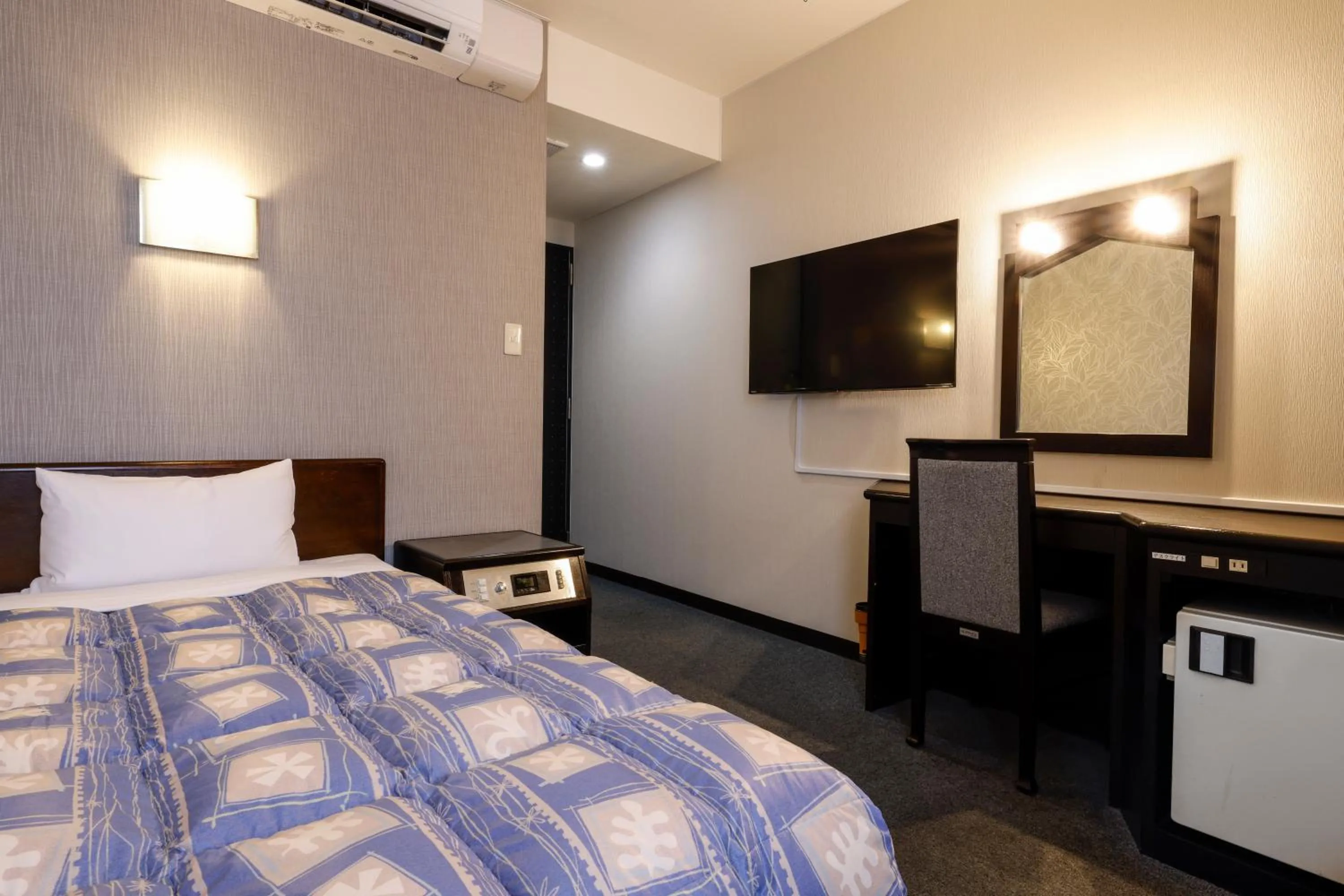 Bed in Kotohira Riverside Hotel