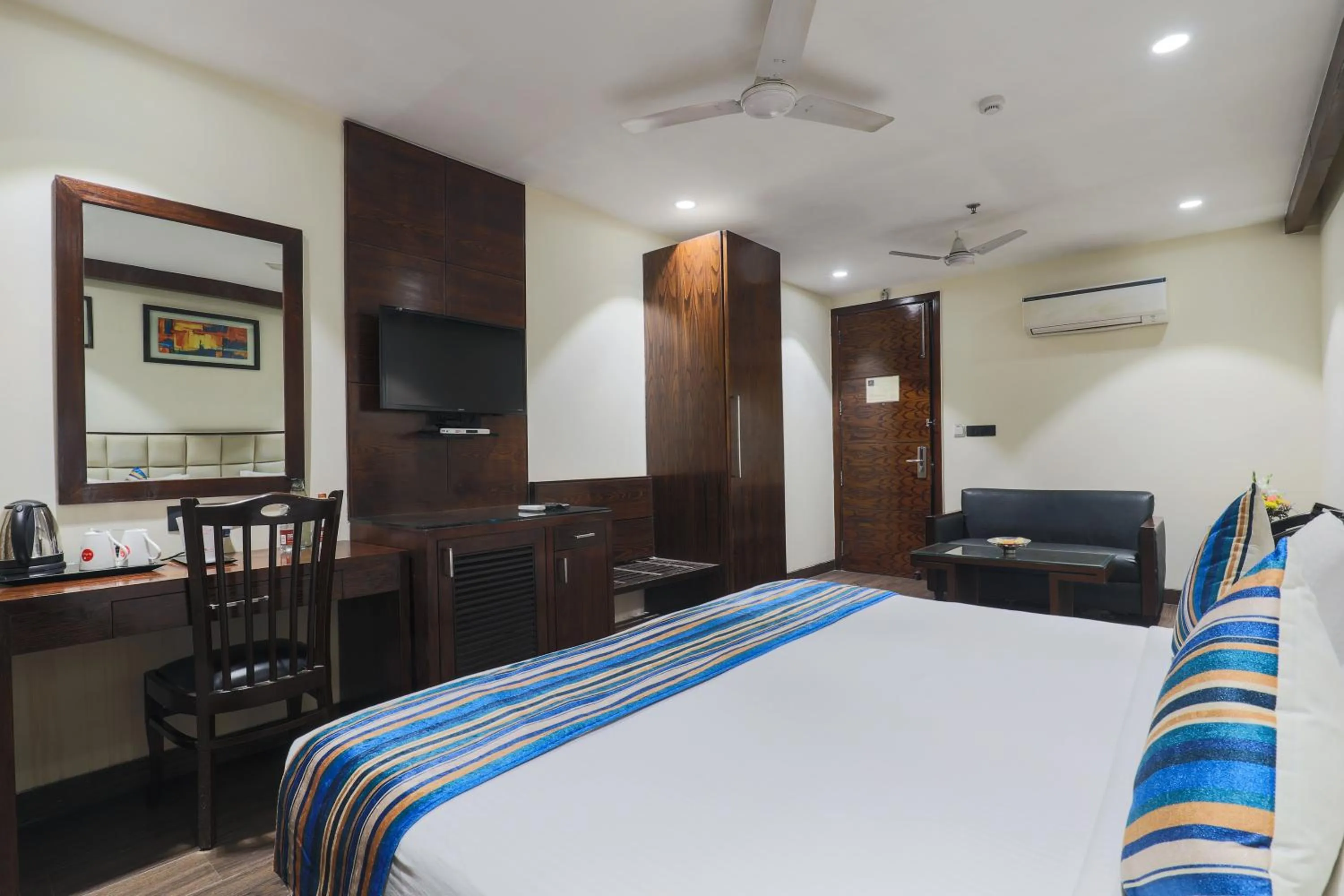 Bedroom, Bed in Hotel Bluestone Nehru Place by The Cosy Hotels