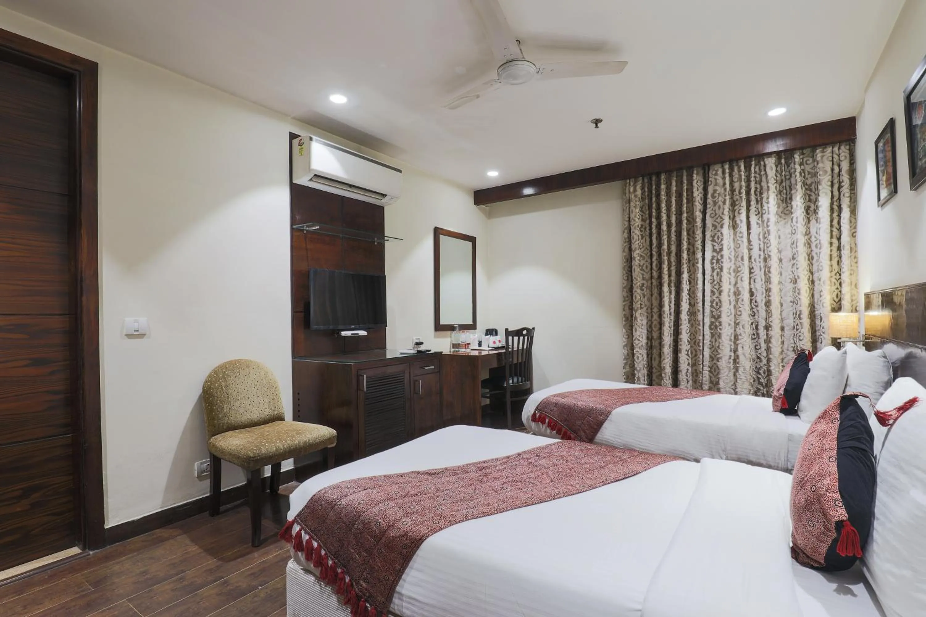 Photo of the whole room, Bed in Hotel Bluestone Nehru Place by The Cosy Hotels