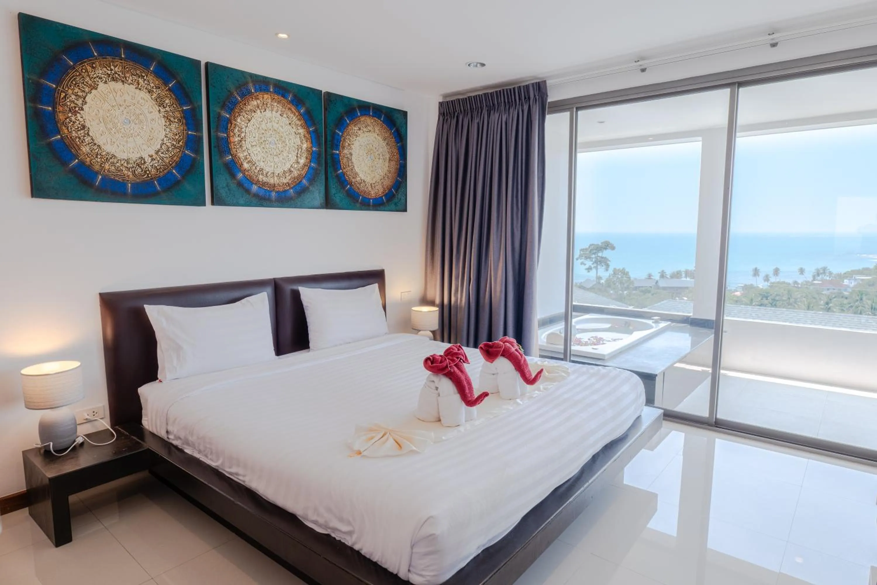 Bed in Tropical Sea View Residence