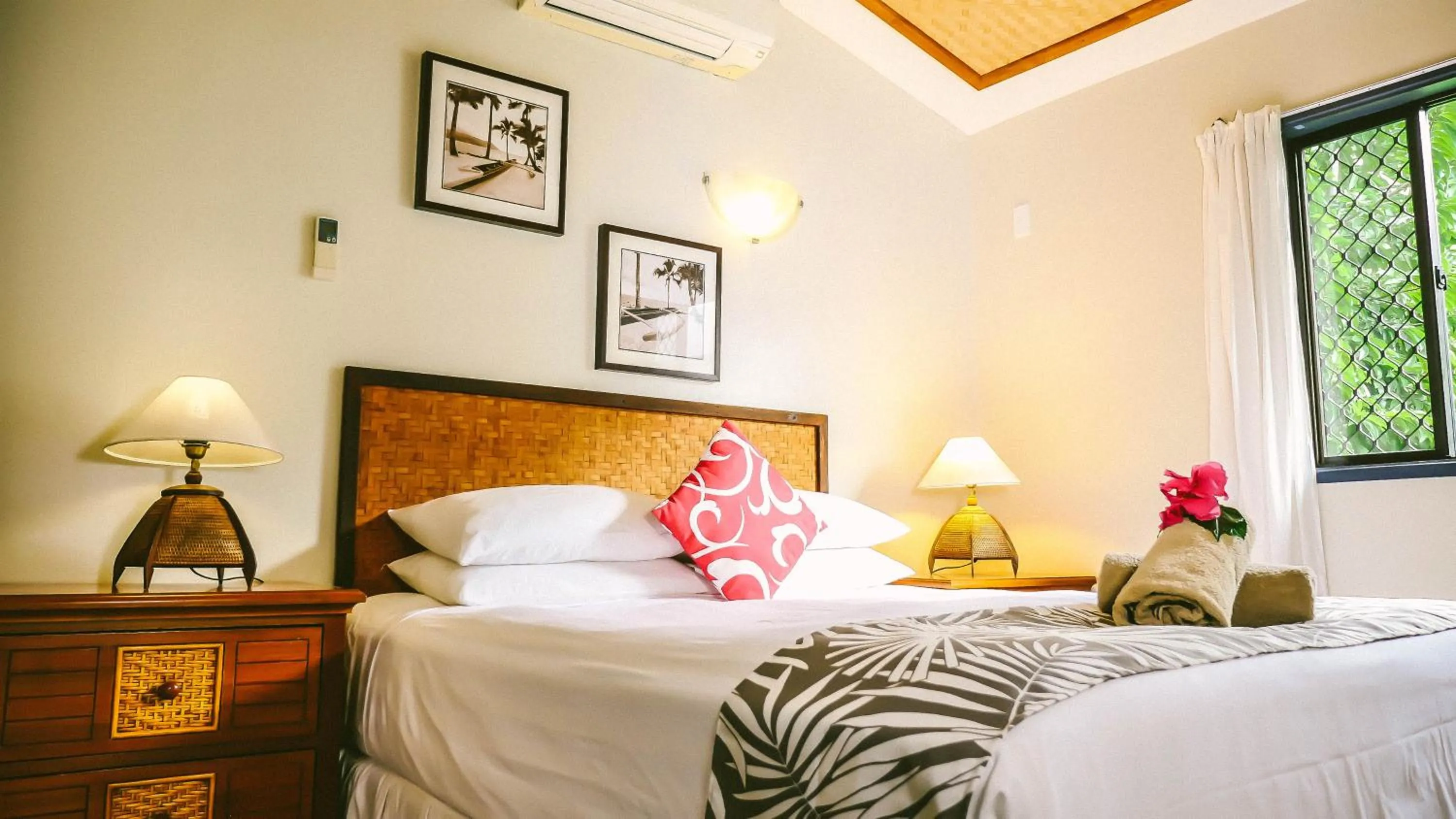 Patio, Bed in Muri Beach Resort