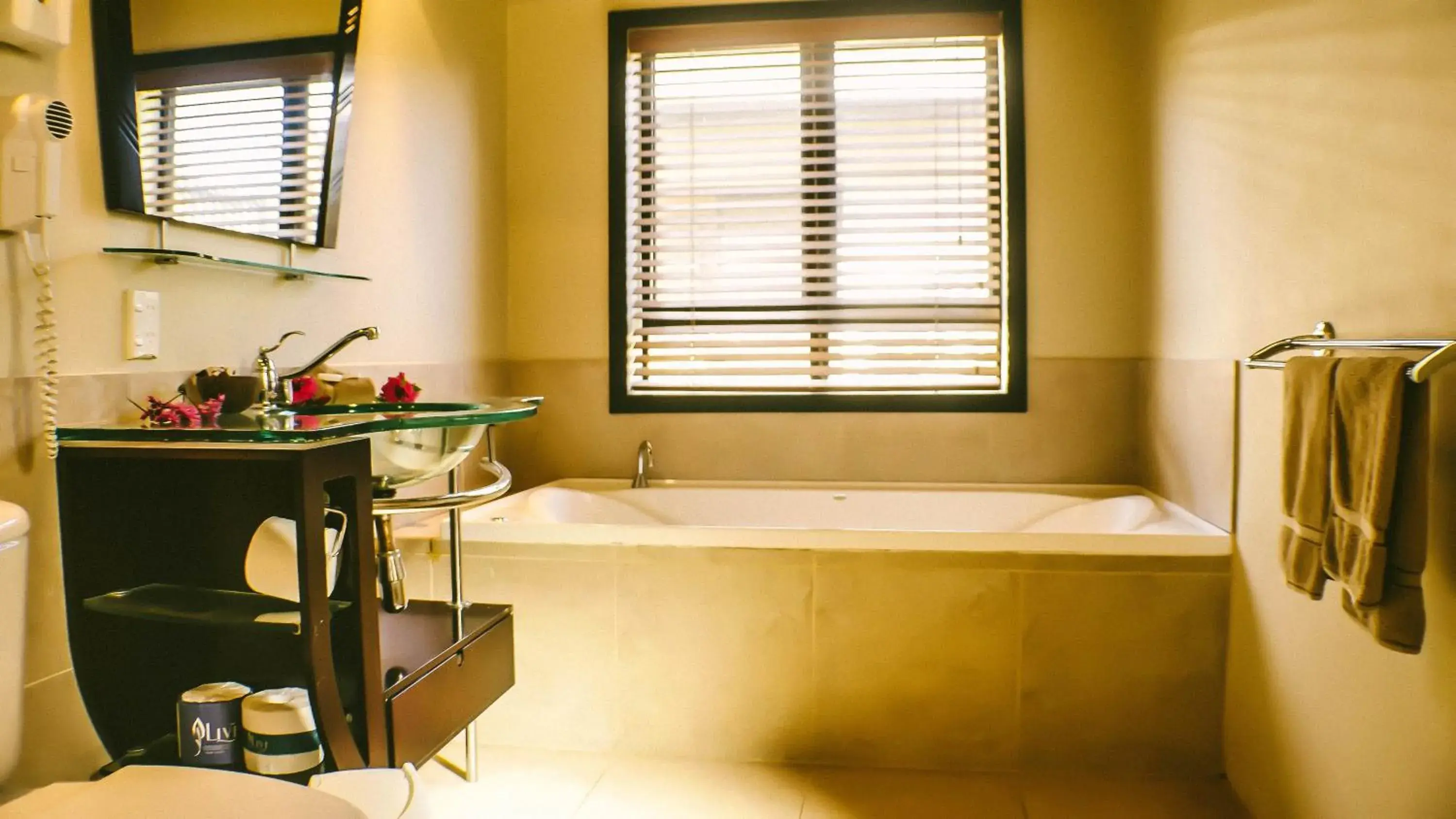 Bathroom in Muri Beach Resort Bathroom in Muri Beach Resort