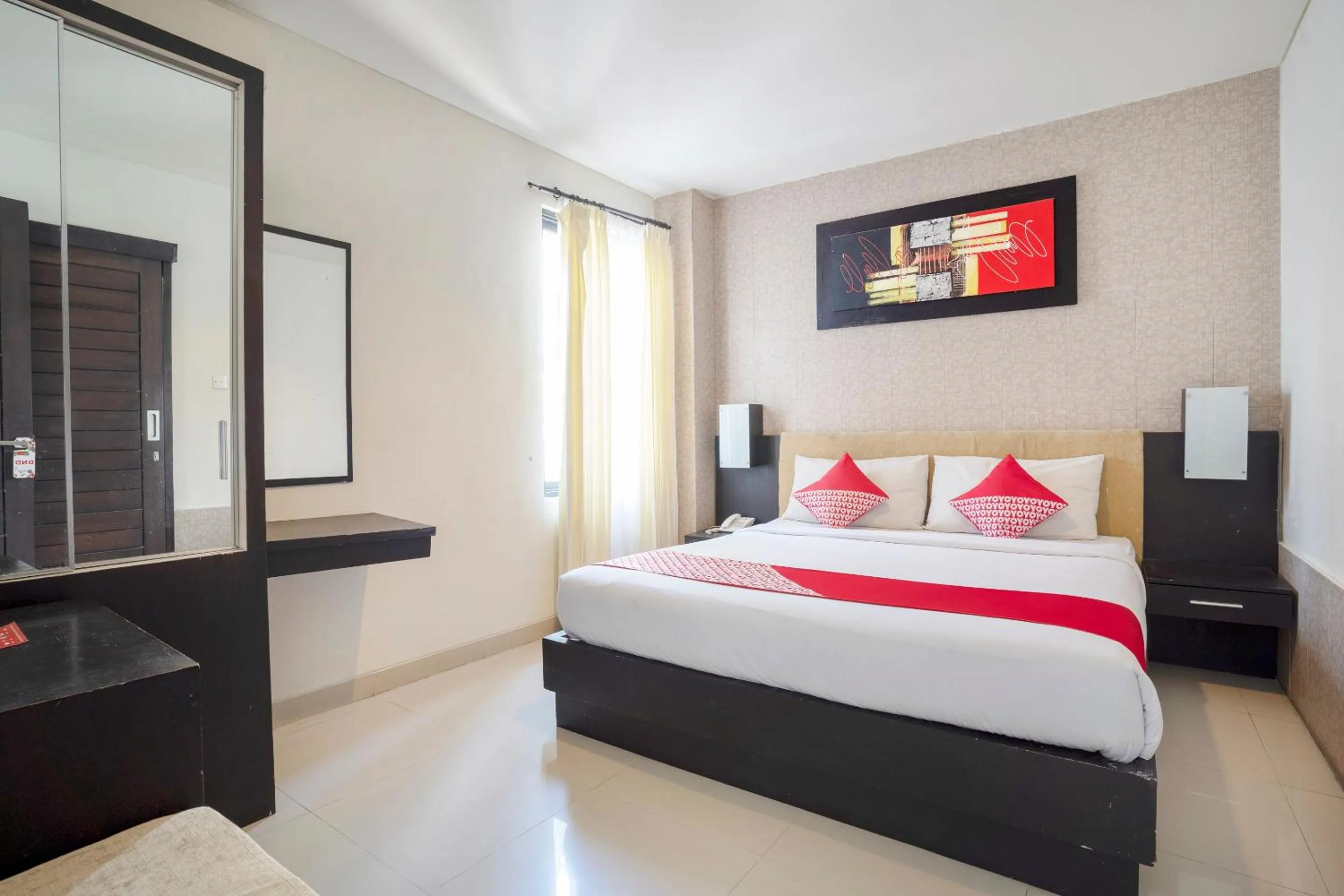 Bedroom in OYO 482 Anika Guest House