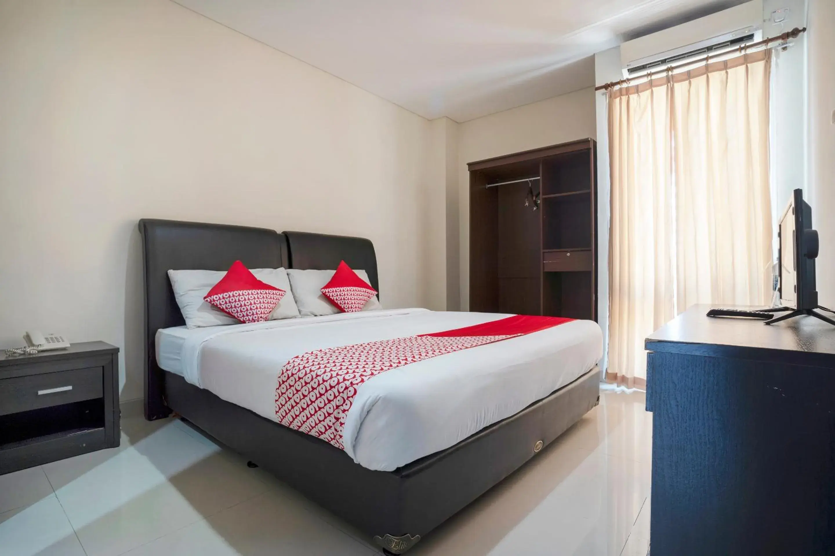 Bedroom in OYO 482 Anika Guest House Bedroom in OYO 482 Anika Guest House