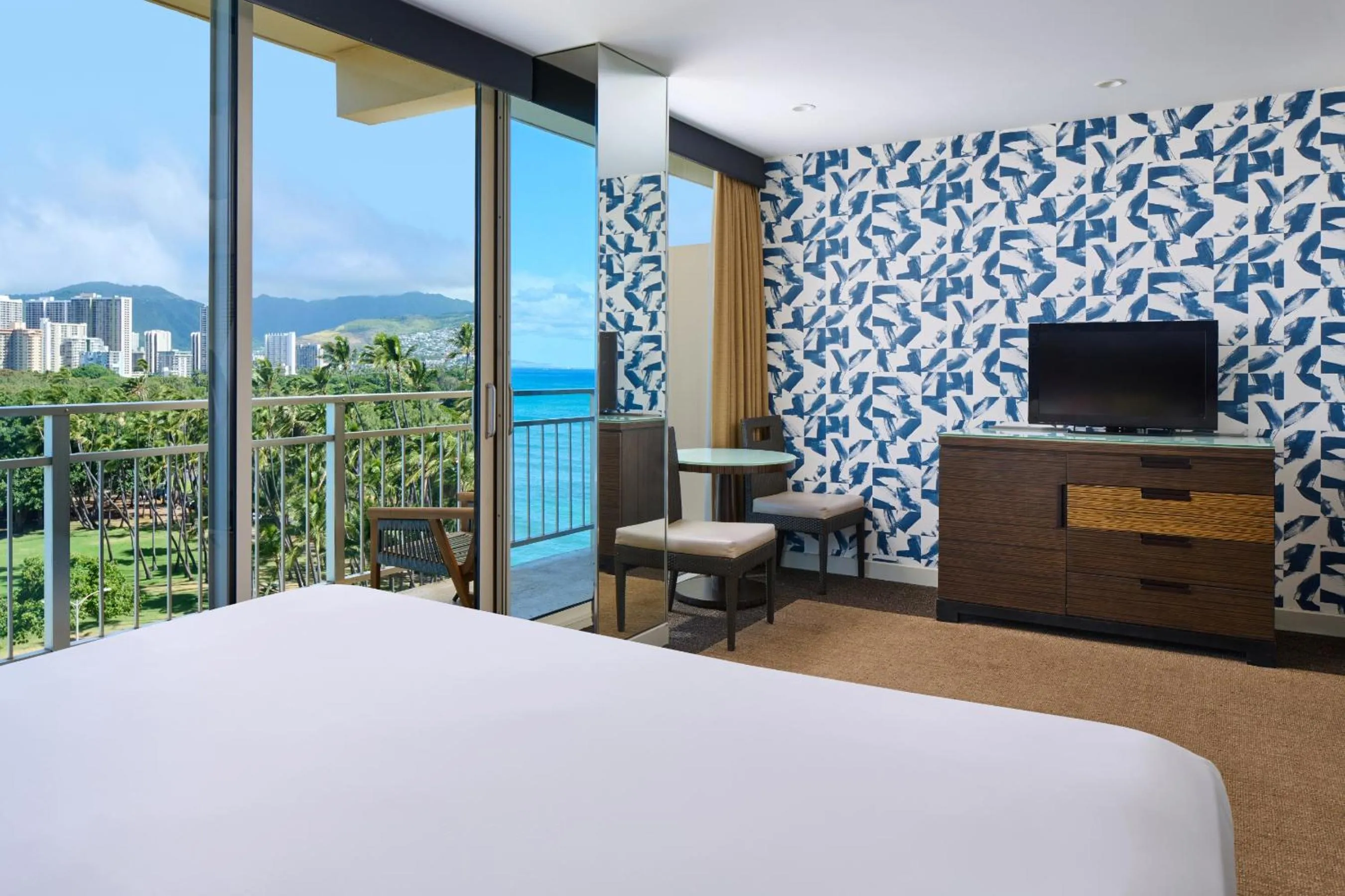 Bed in Kaimana Beach Hotel