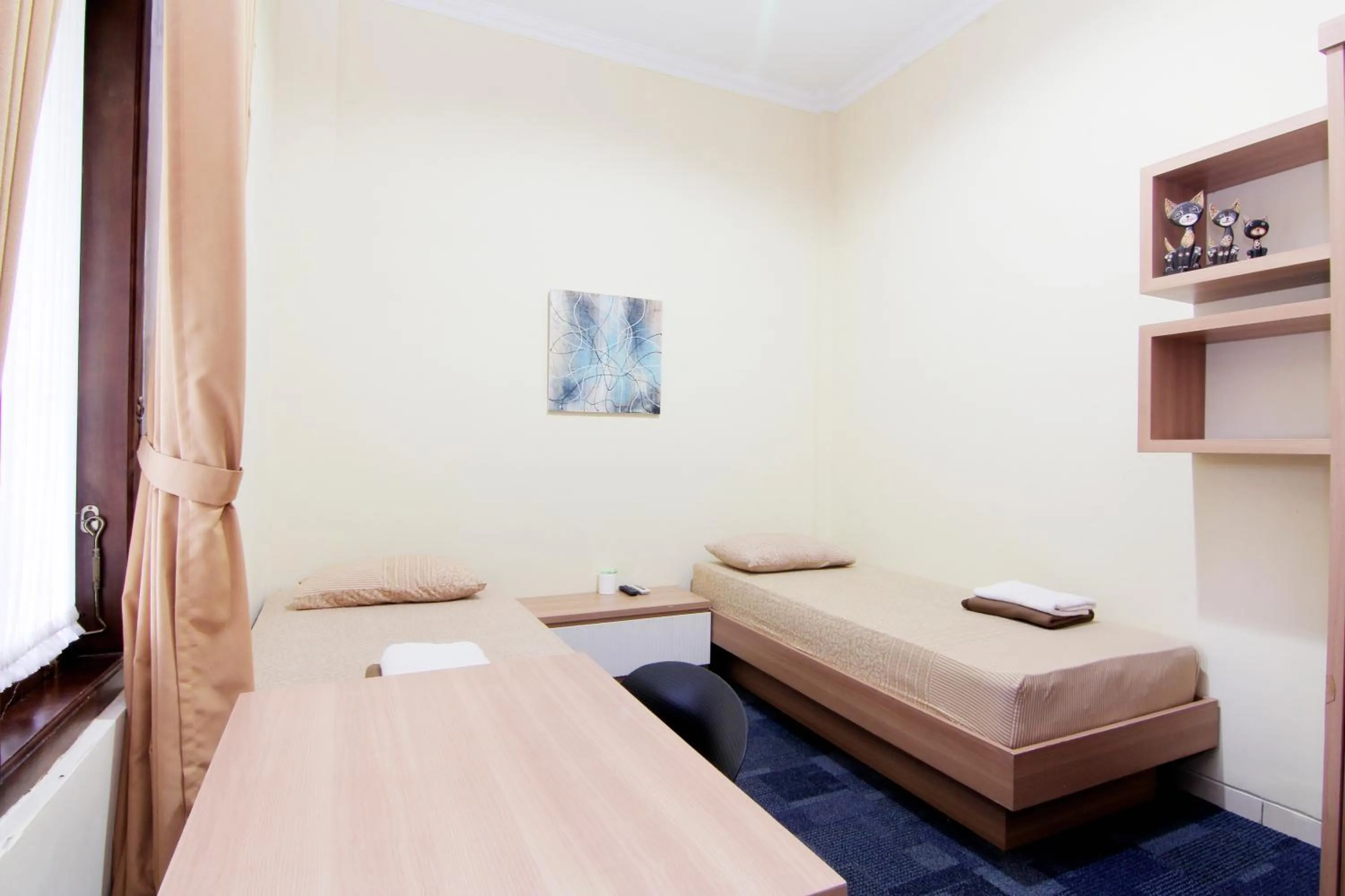 Bed in Embe Joglo Homestay