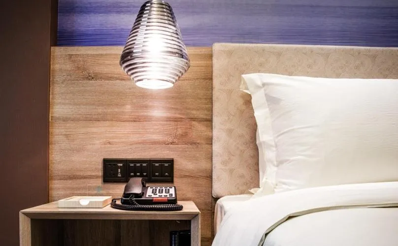 Bed in Atour Hotel Shanghai Xinzhuang