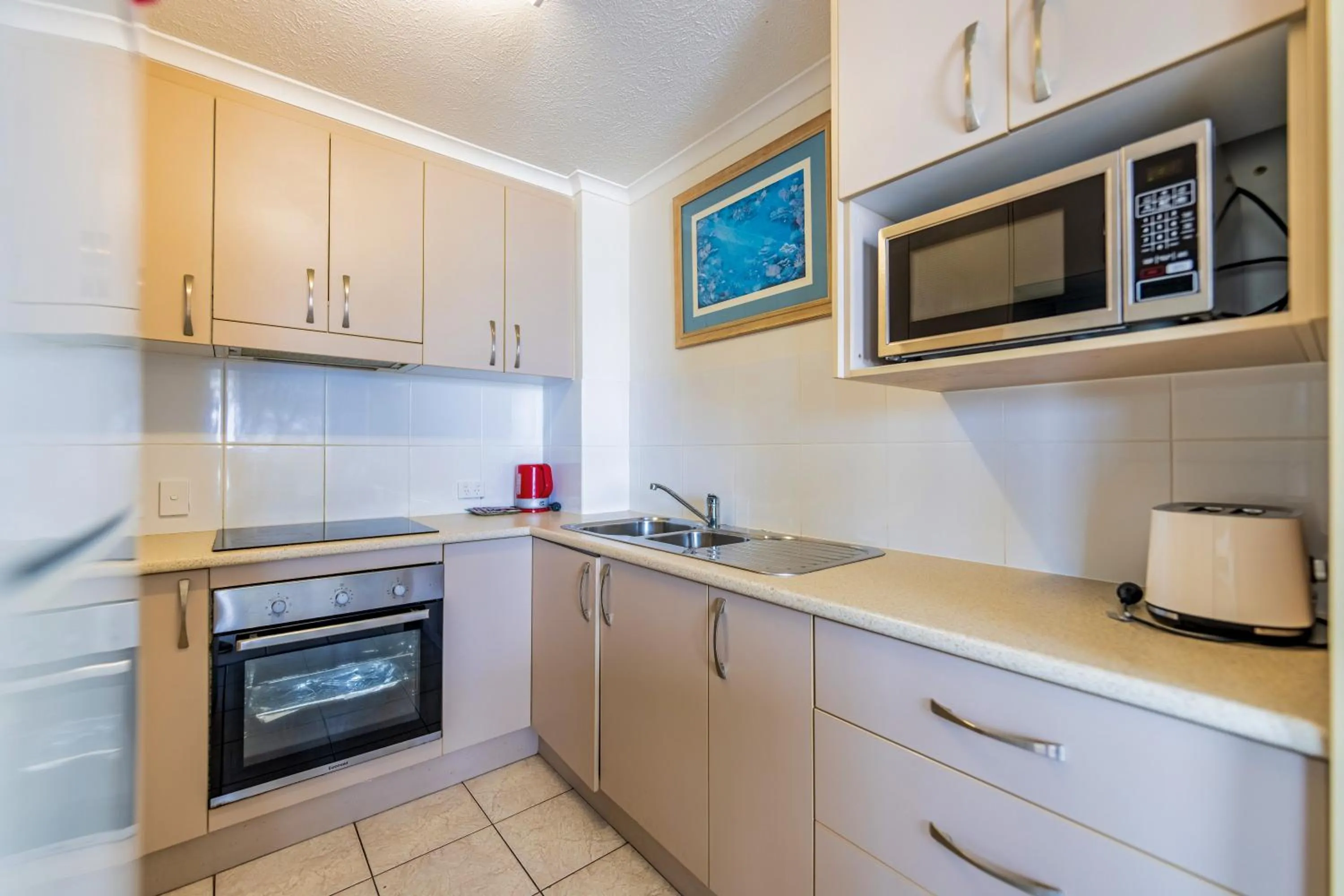 kitchen in Olympus Beachfront Apartments