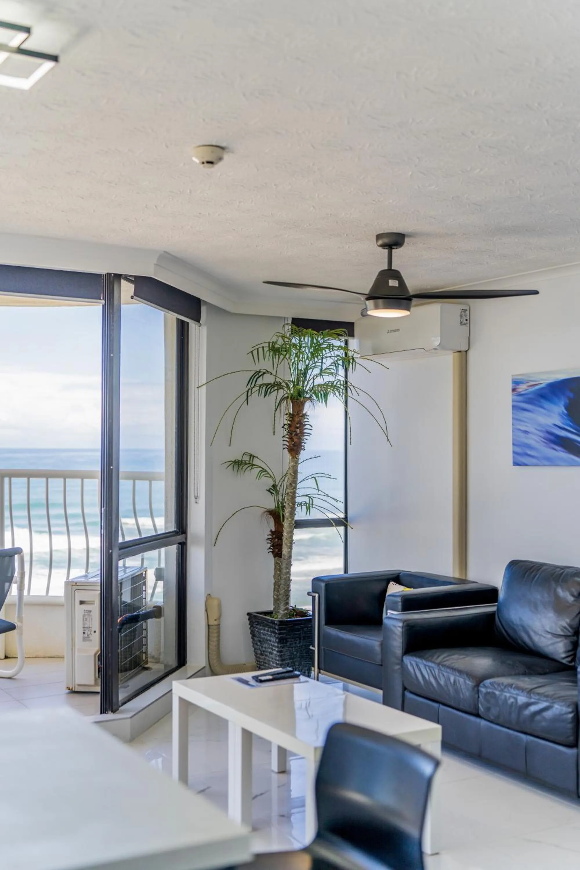 Living room in Olympus Beachfront Apartments