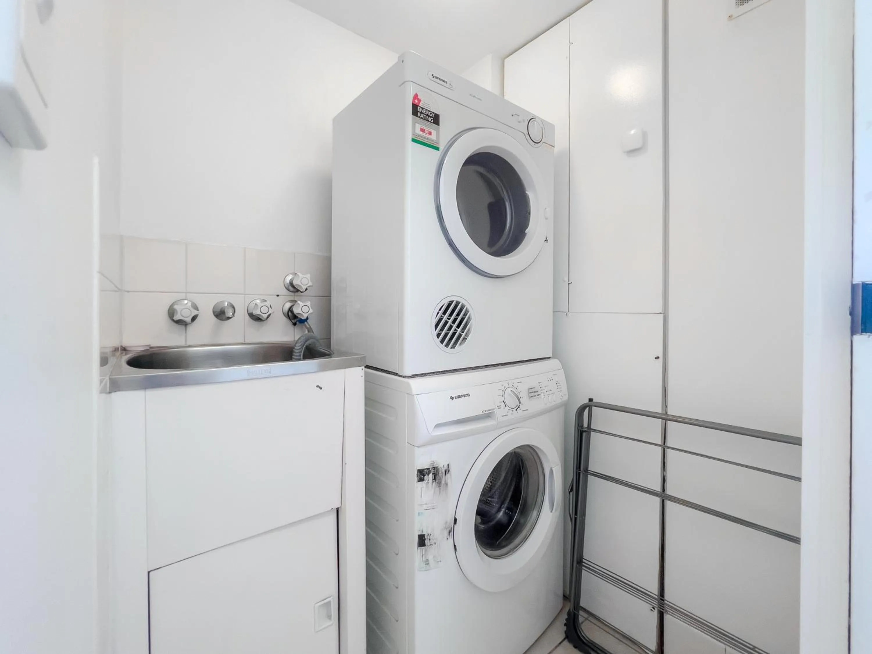 laundry in Olympus Beachfront Apartments