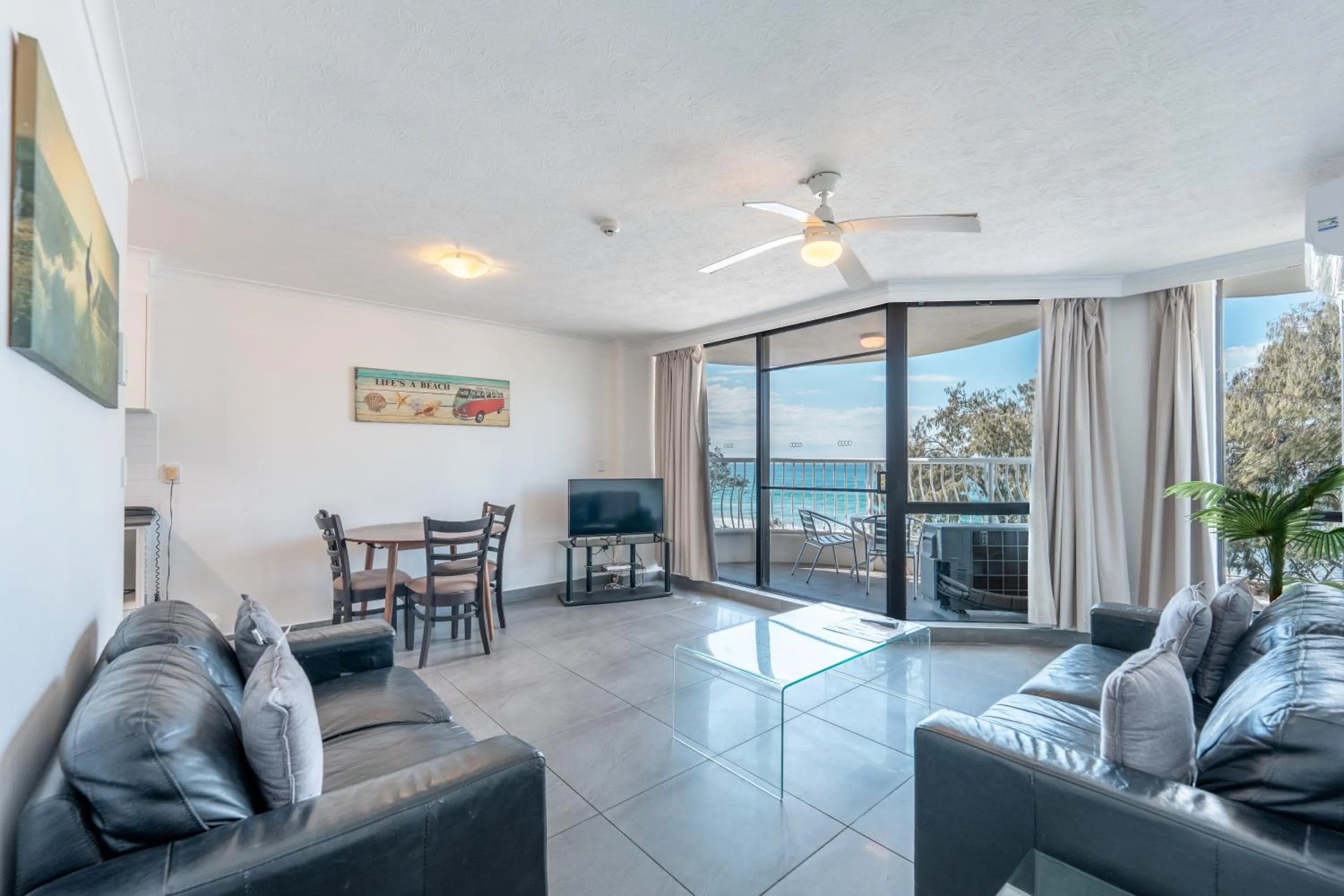 Living room in Olympus Beachfront Apartments