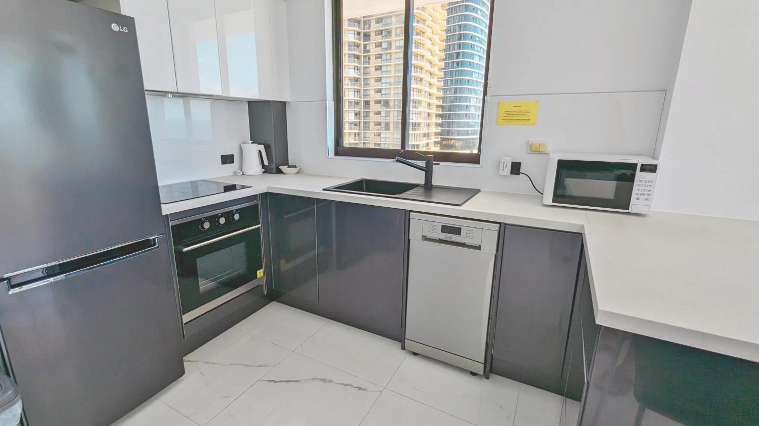 dishwasher in Olympus Beachfront Apartments