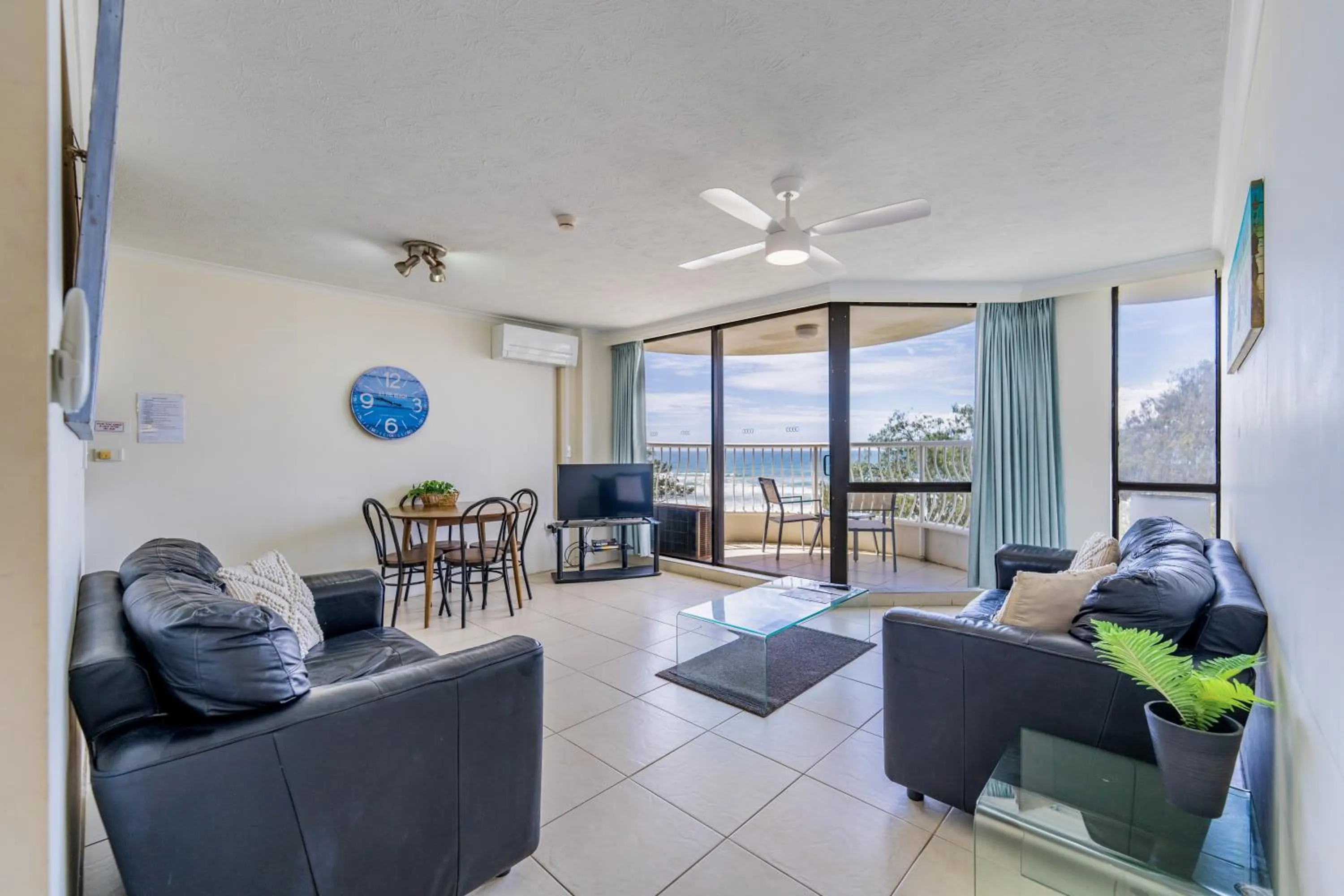 Living room in Olympus Beachfront Apartments