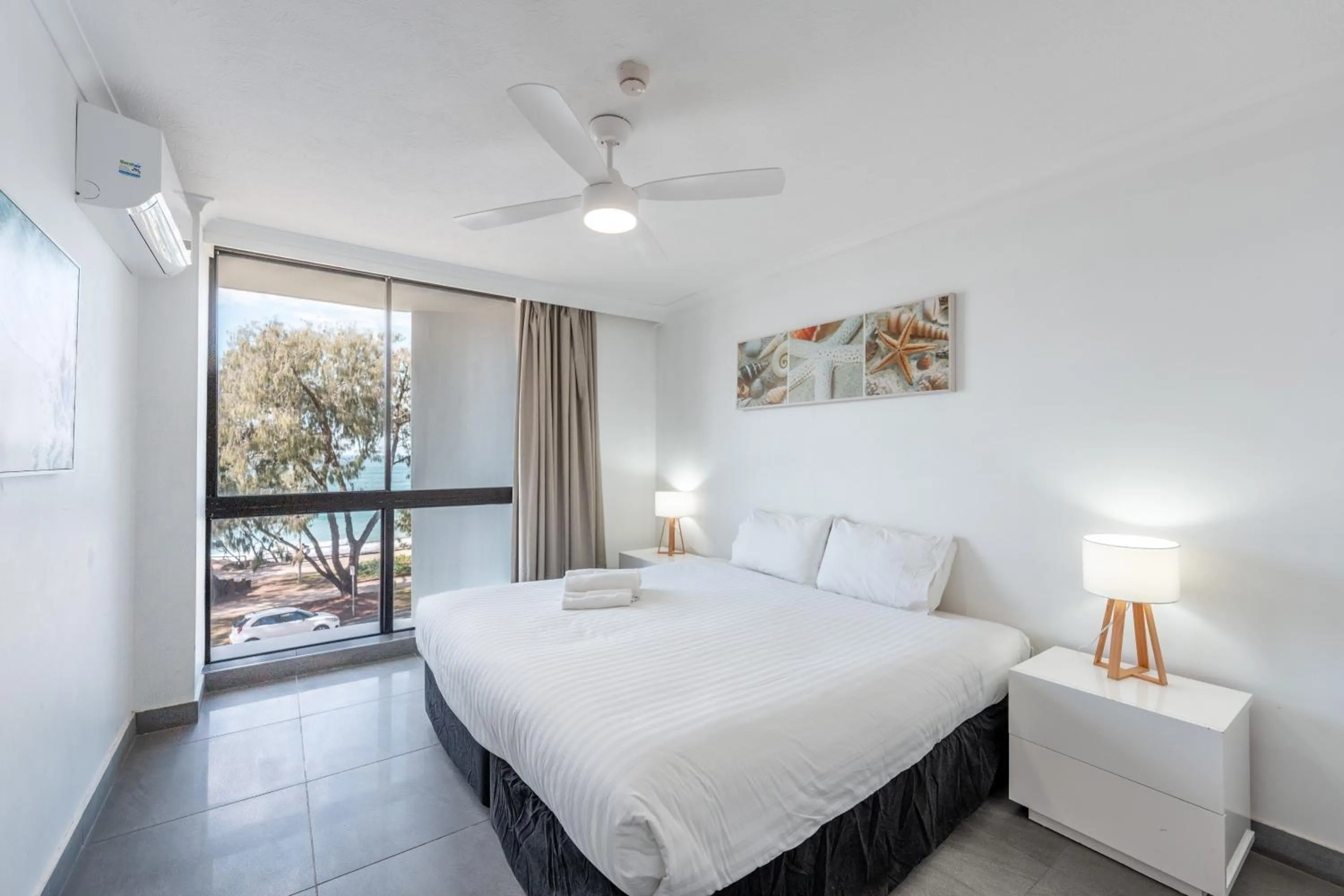 Bedroom, Bed in Olympus Beachfront Apartments